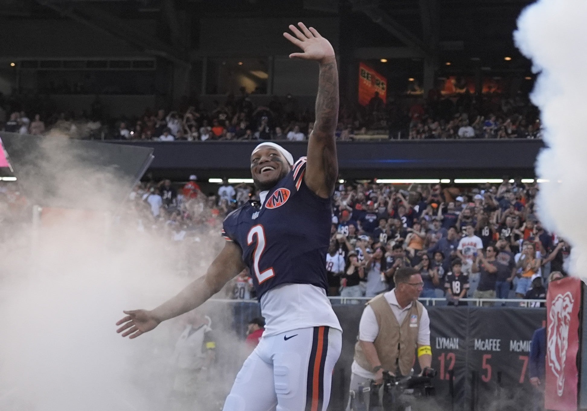 Aug 17, 2025; Chicago, Illinois, USA; Chicago Bears wide receiver DJ Moore (2) is introduced before the game against the Buffalo Bills at Soldier Field.