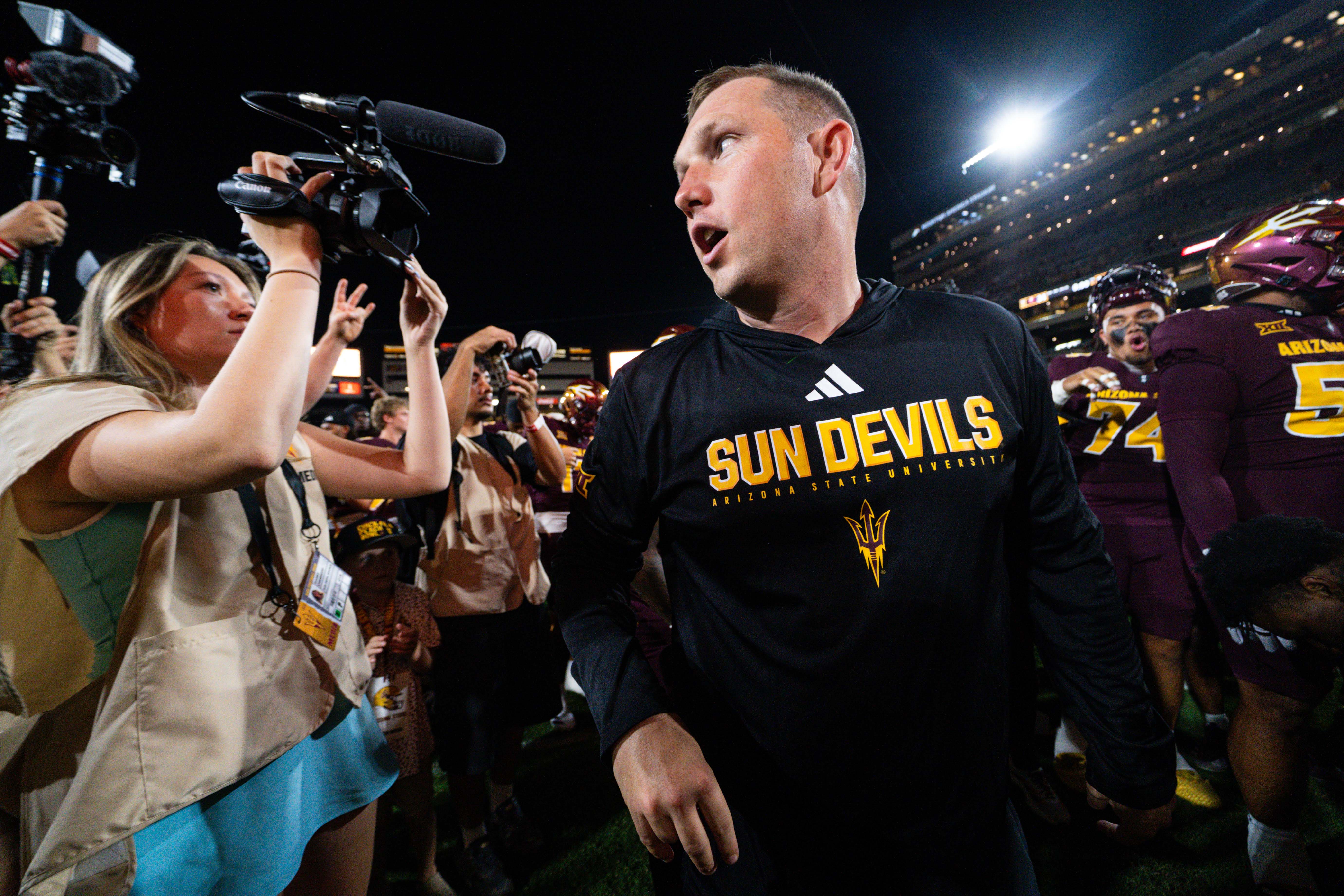 Sep 13, 2025; Tempe, Arizona, USA; Arizona State Sun Devils head coach Kenny Dillingham looks around after a game against Texas State Bobcats at Mountain America Stadium.