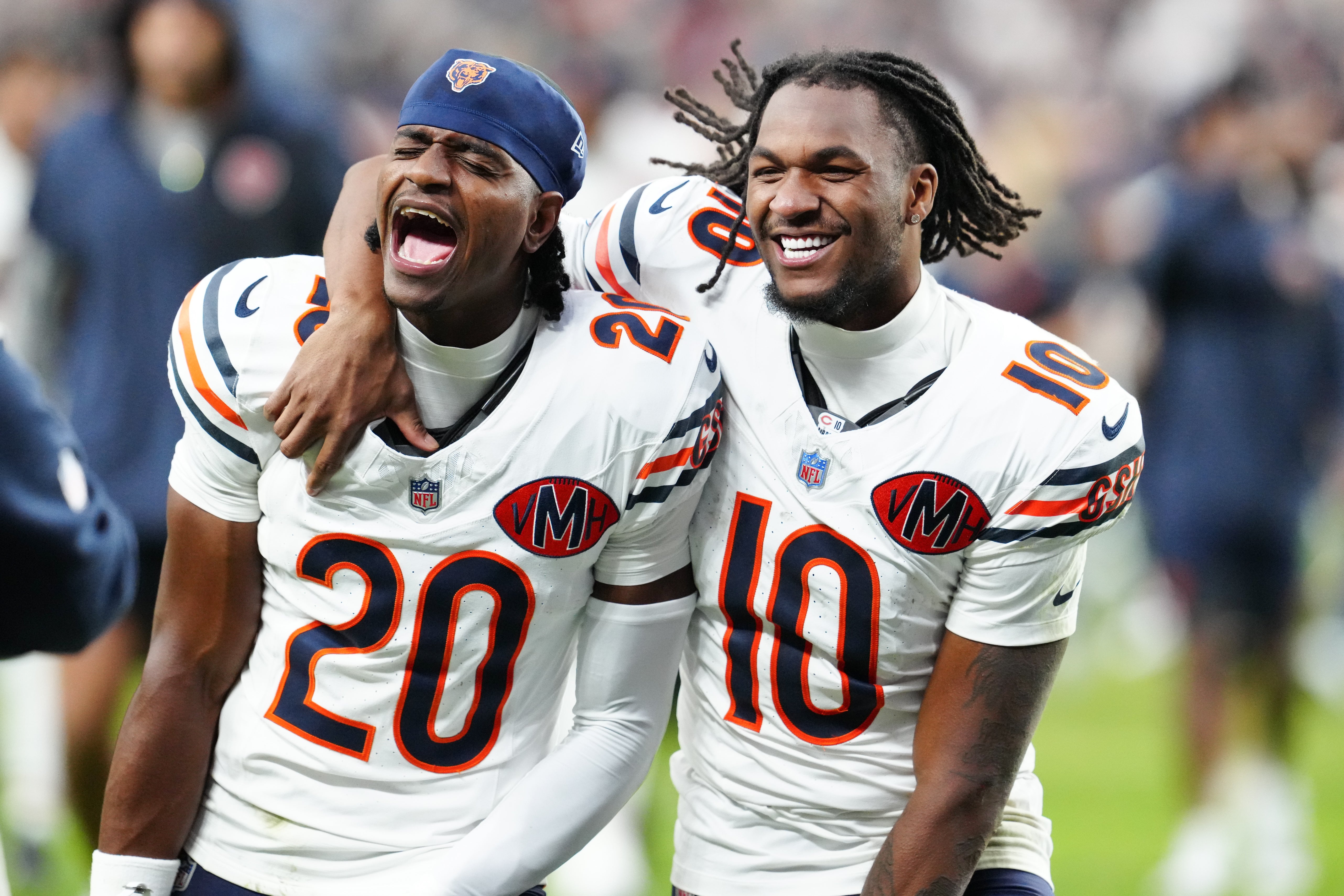 Sep 28, 2025; Paradise, Nevada, USA; Chicago Bears wide receiver Luther Burden III (10) and Jahdae Walker (20) celebrate after the game against the Las Vegas Raiders at Allegiant Stadium.