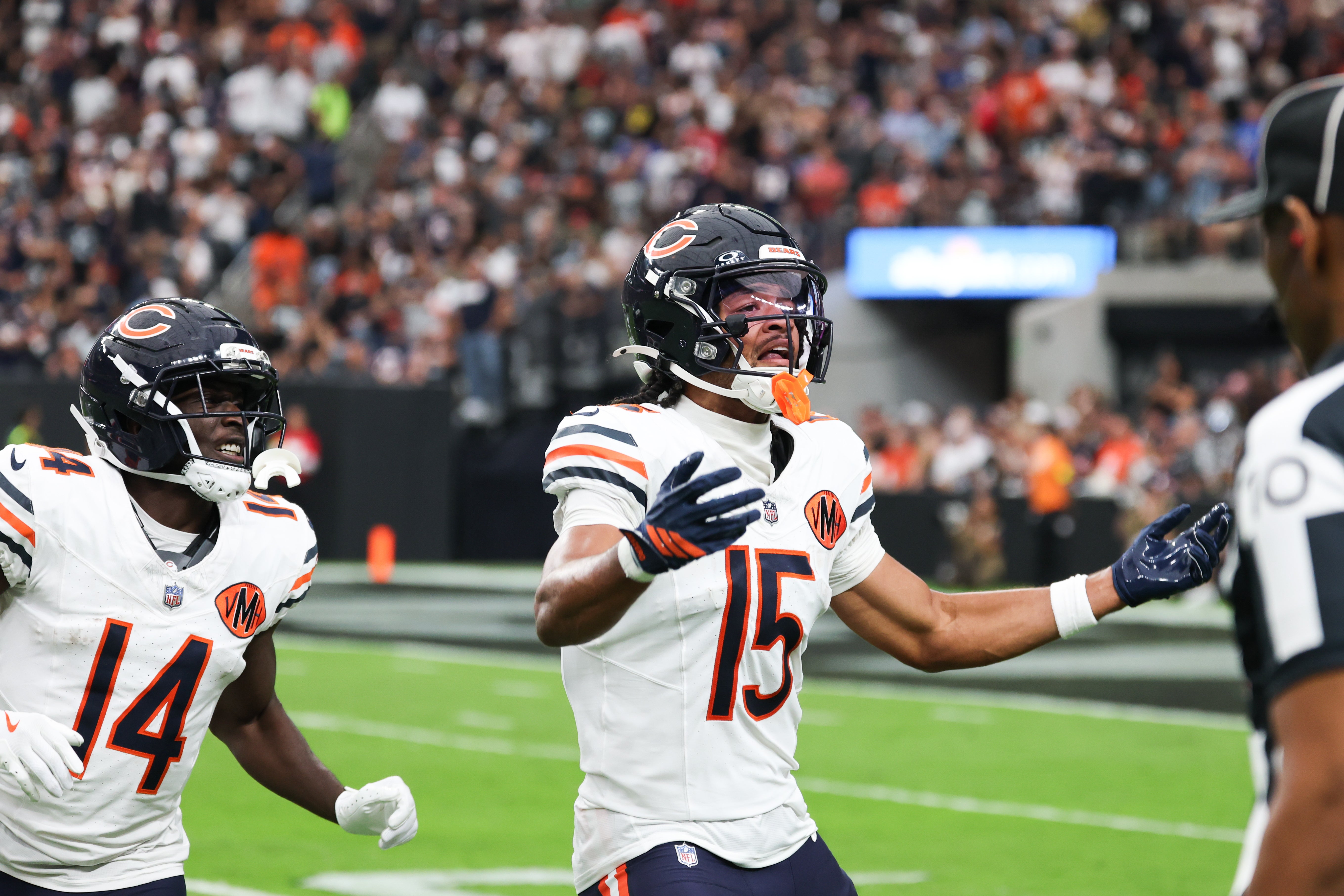Sep 28, 2025; Paradise, Nevada, USA; Chicago Bears wide receiver Rome Odunze (15) celebrates a successful two point conversion against the Las Vegas Raiders at Allegiant Stadium.