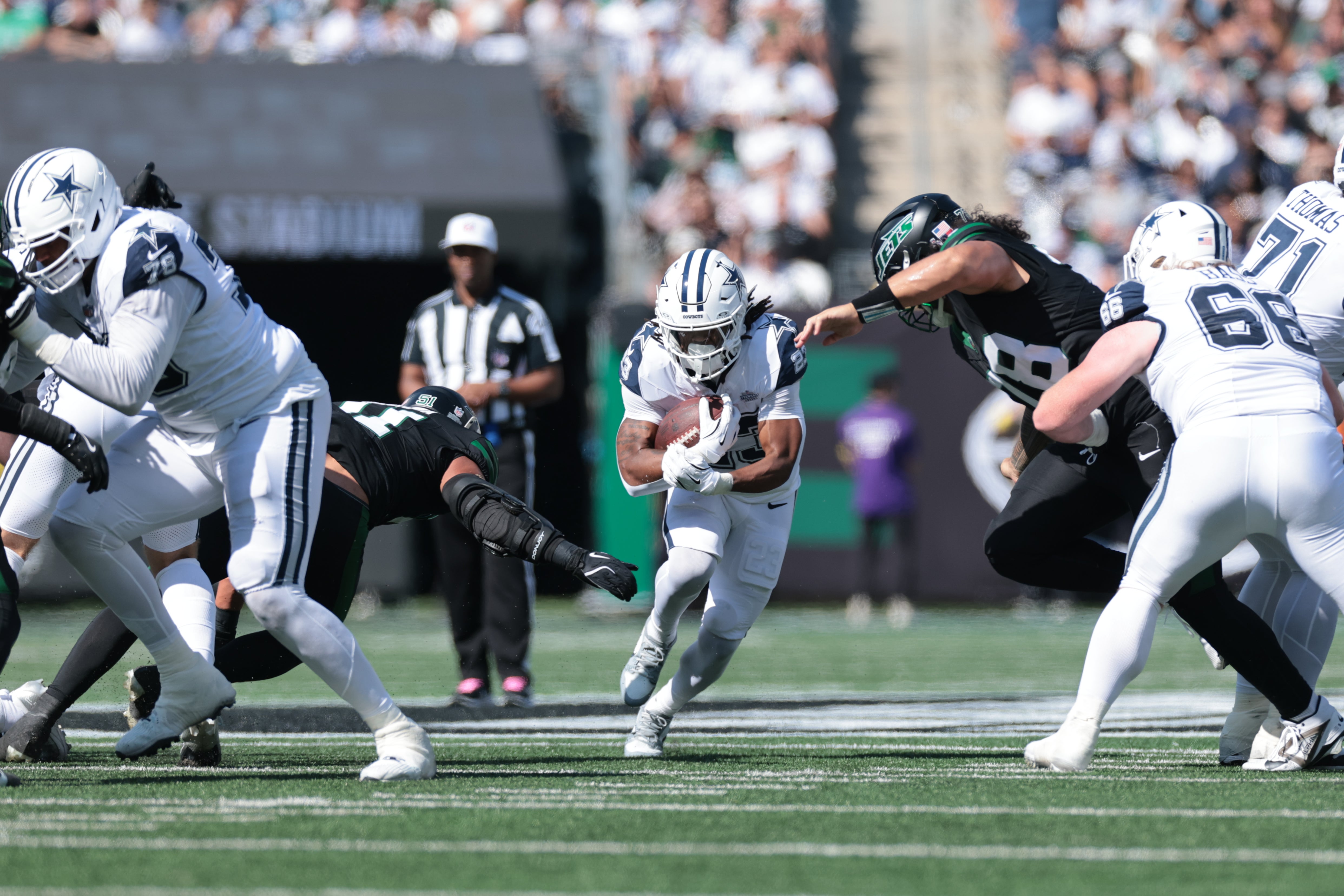 Oct 5, 2025; East Rutherford, New Jersey, USA; Dallas Cowboys running back Jaydon Blue (23) carries the ball against the New York Jets.