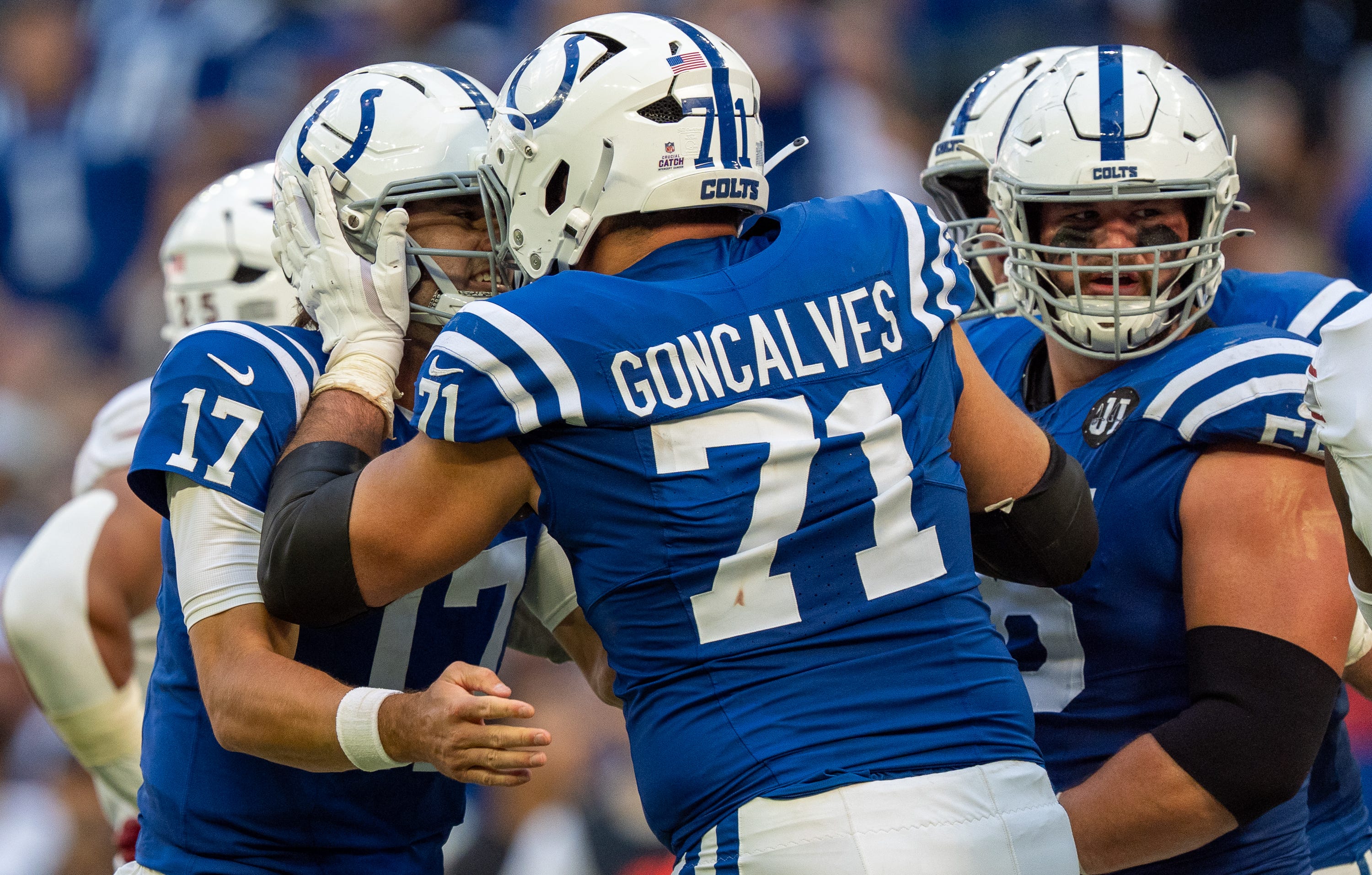 Colts RG Matt Goncalves celebrates with QB Daniel Jones