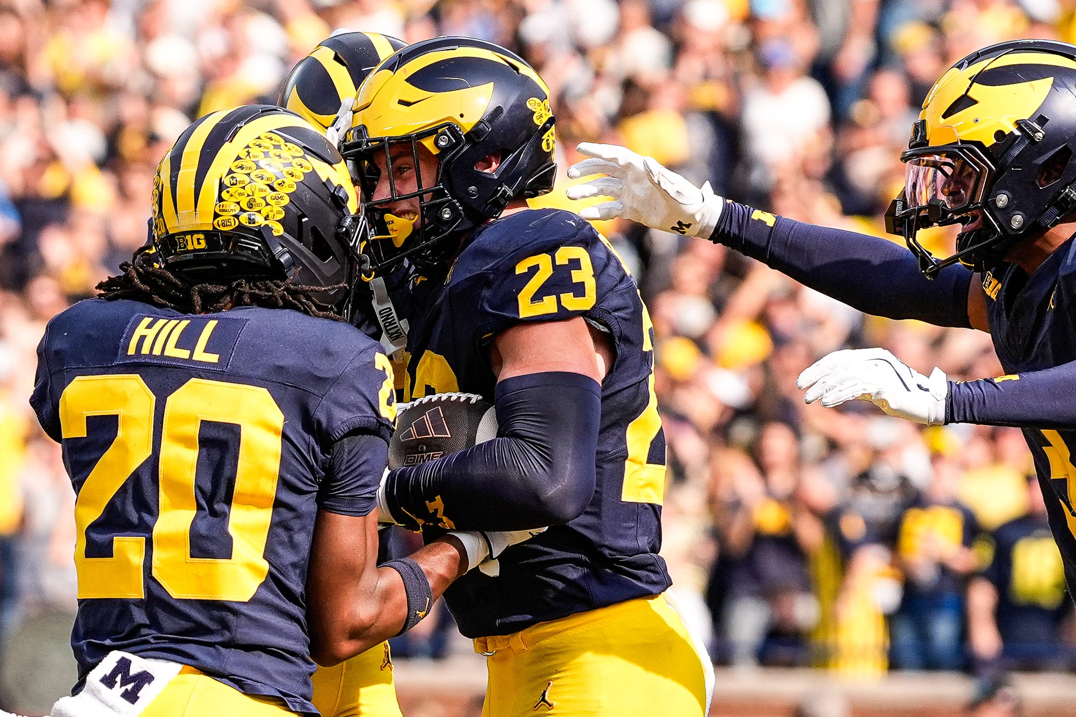Michigan linebacker Cole Sullivan (23) celebrates an interception against Washington during the second half at Michigan Stadium in Ann Arbor on Saturday, Oct. 18, 2025.
