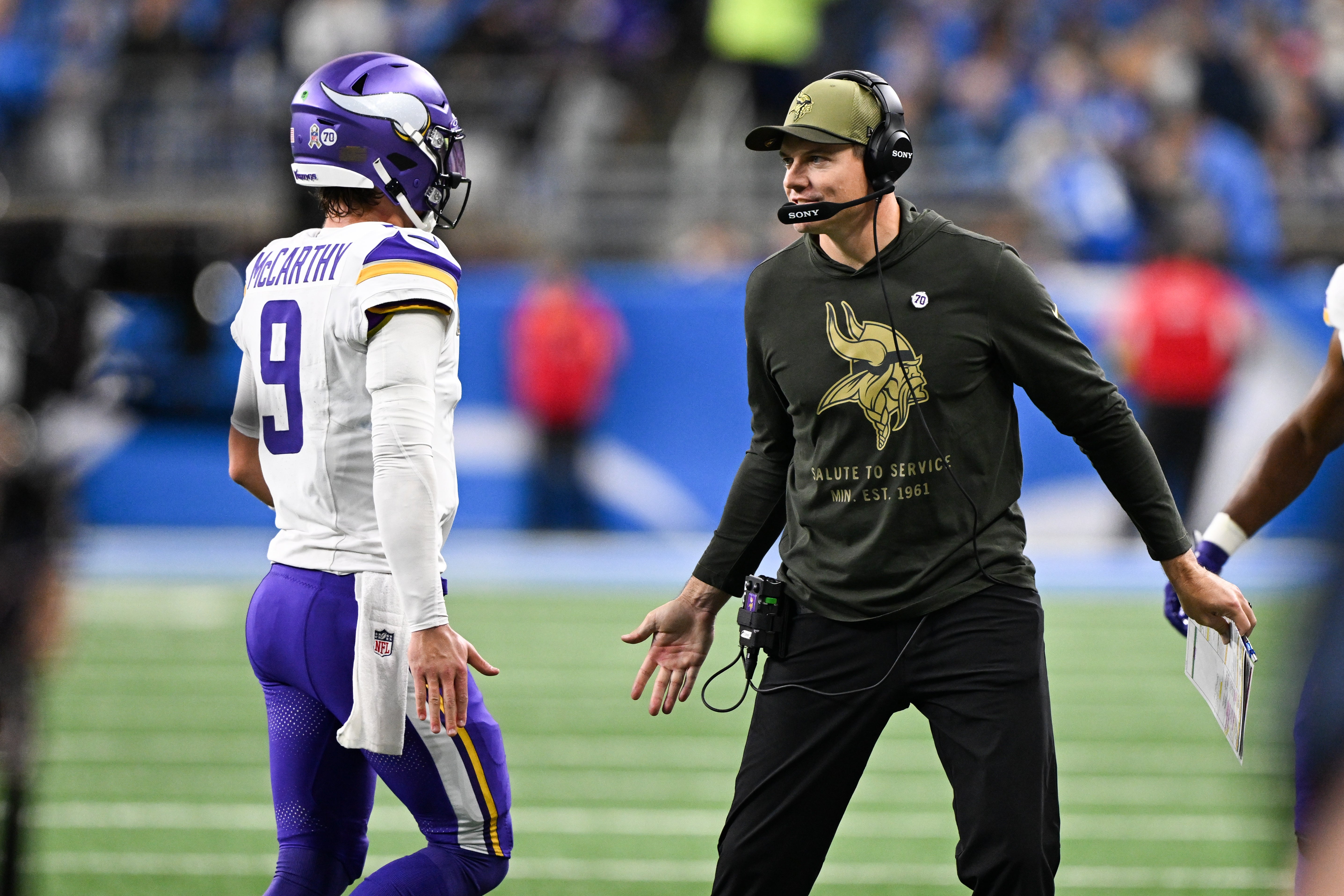 Nov 2, 2025; Detroit, Michigan, USA; Minnesota Vikings head coach Kevin O'Connell greets quarterback J.J. McCarthy (9) after throwing a touchdown pass in the first quarter at Ford Field.