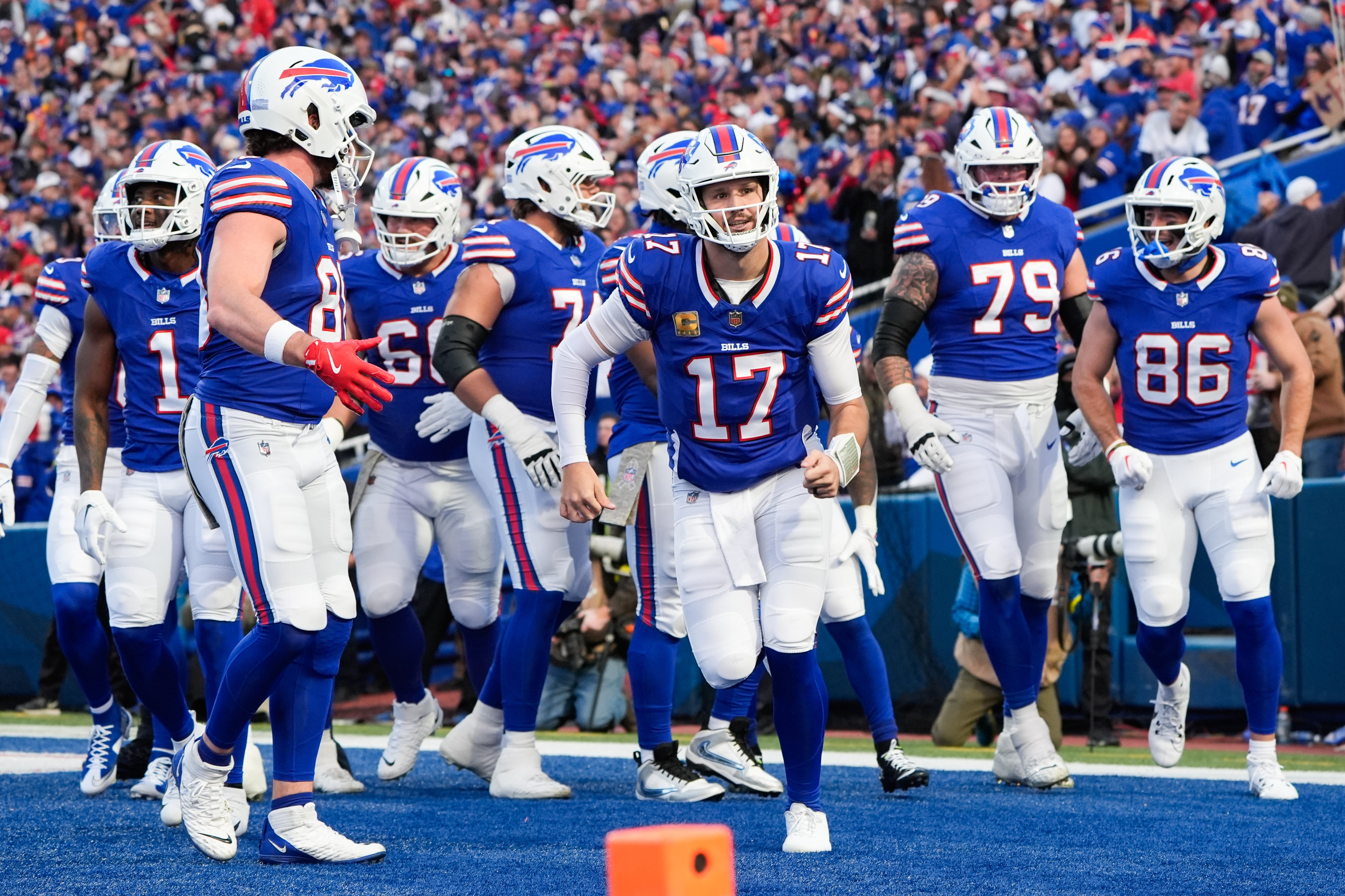 Nov 2, 2025; Orchard Park, New York, USA; Buffalo Bills quarterback Josh Allen (17) celebrates a touchdown scored by tight end Dalton Kincaid (86) in the first quarter against the Kansas City Chiefs at Highmark Stadium.