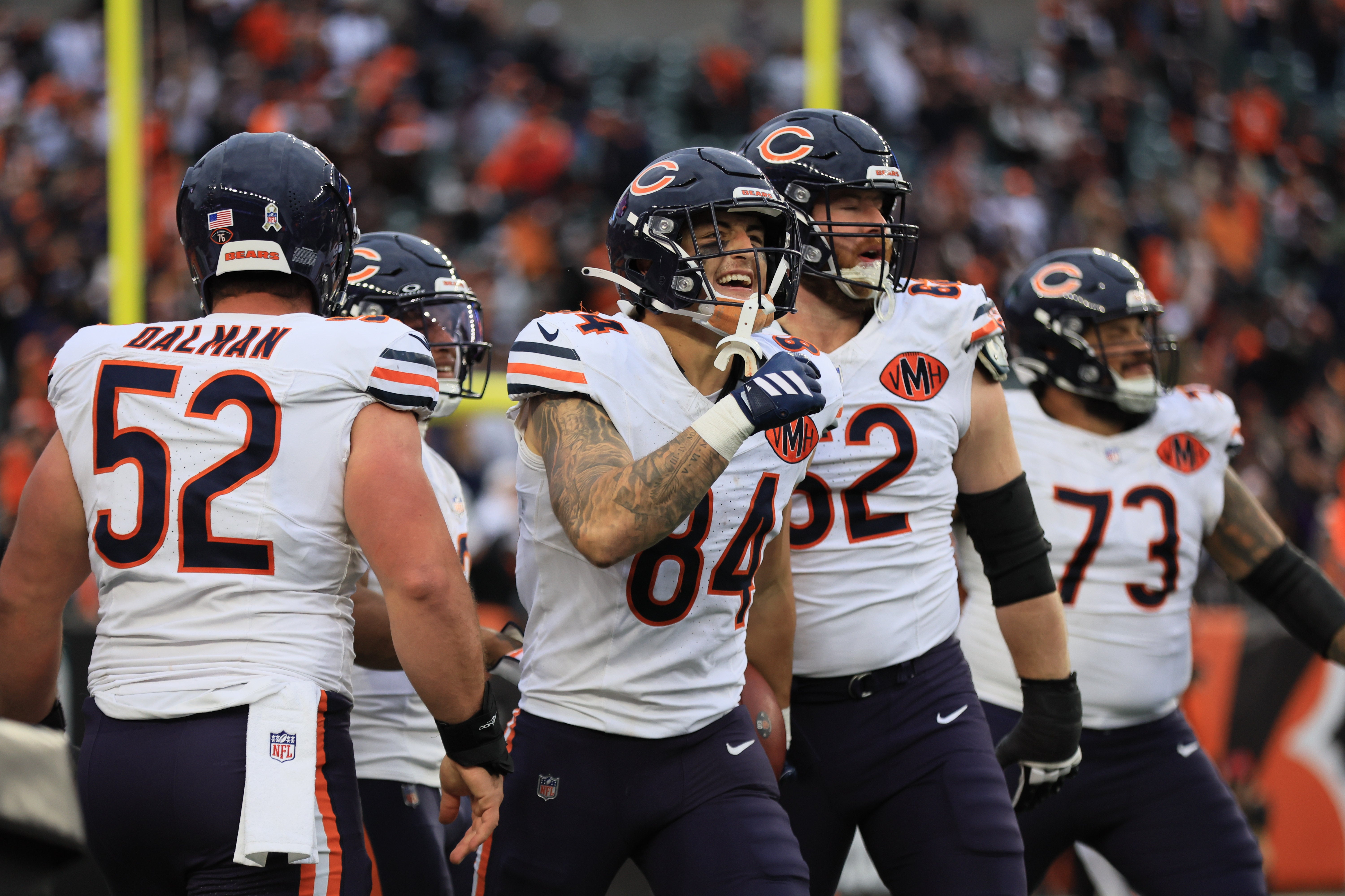 Nov 2, 2025; Cincinnati, Ohio, USA; Chicago Bears tight end Colston Loveland (84) celebrates with guard Joe Thuney (62), center Drew Dalman (52) and guard Jonah Jackson (73) after scoring a touchdown against the Cincinnati Bengals during the fourth quarter at Paycor Stadium.