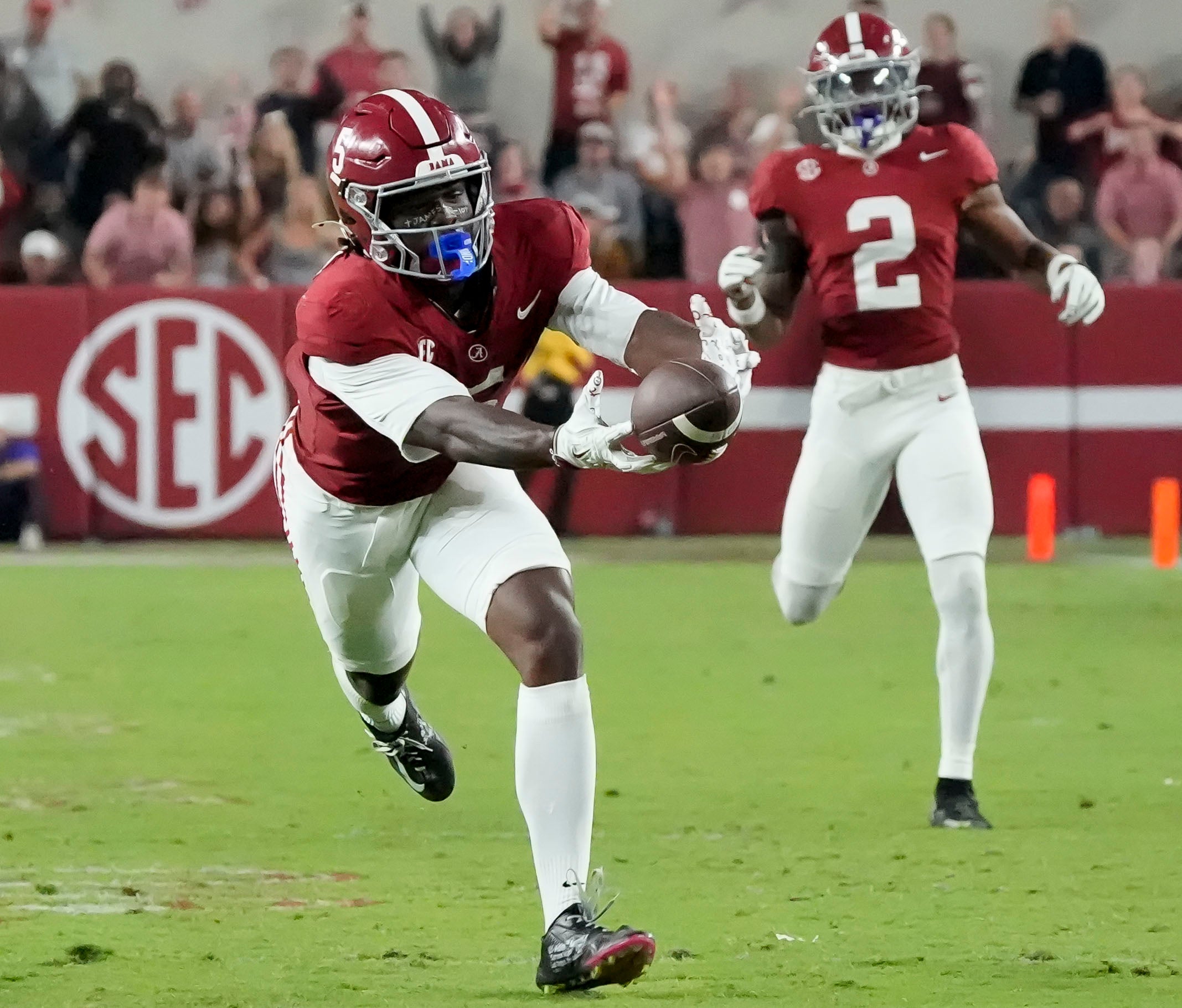 Nov 8, 2025; Tuscaloosa, Alabama, USA; A long pass to a wide open Alabama wide receiver Germie Bernard (5) is just a shade too long and falls incomplete during the second half of the game with LSU at Saban Field at Bryant-Denny Stadium. Alabama defeated LSU 20-9. Mandatory Credit: Gary Cosby Jr.-Imagn Images