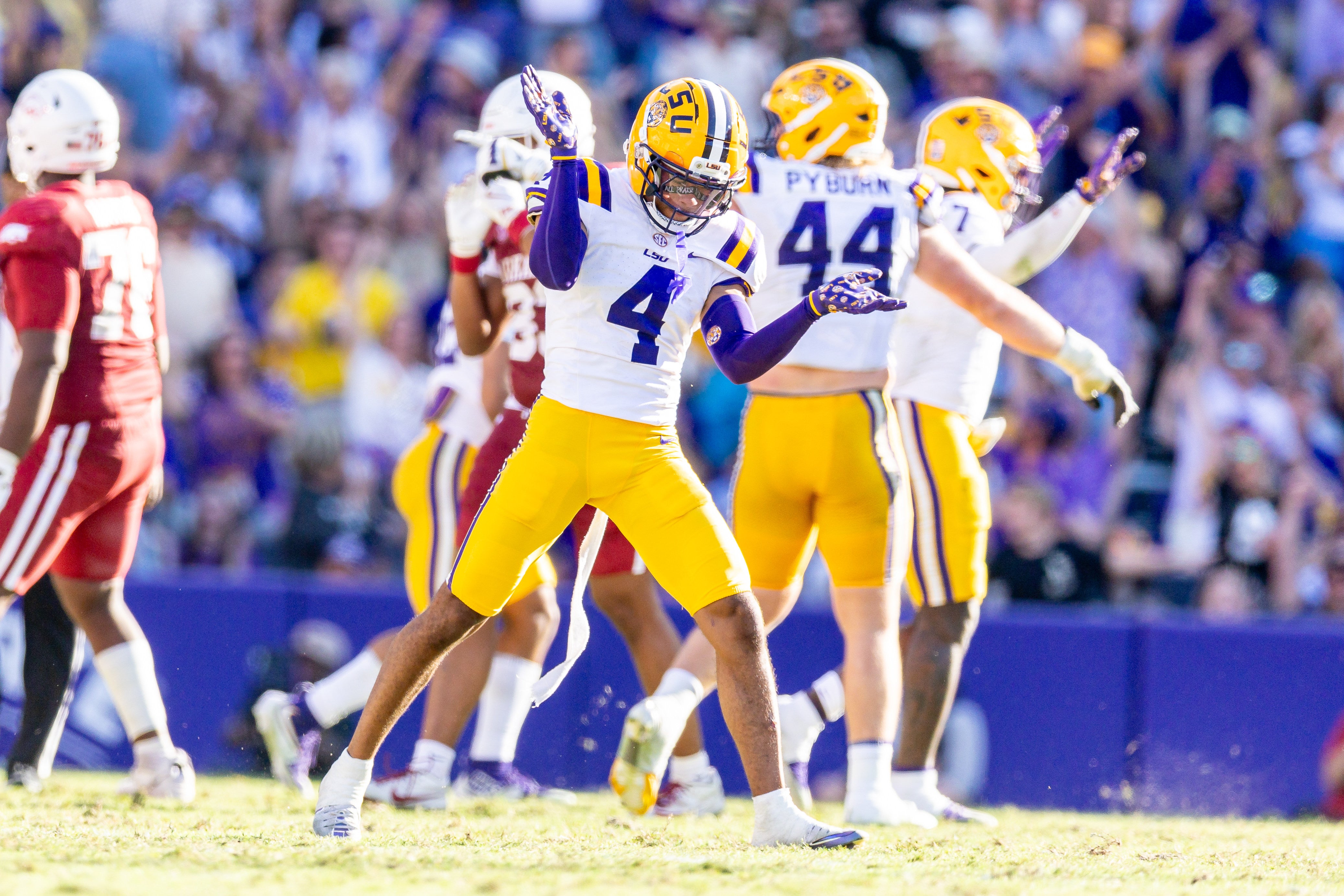 Nov 15, 2025; Baton Rouge, Louisiana, USA; LSU Tigers cornerback Mansoor Delane (4) reacts to a stop on fourth down against the Arkansas Razorbacks during the second half at Tiger Stadium.