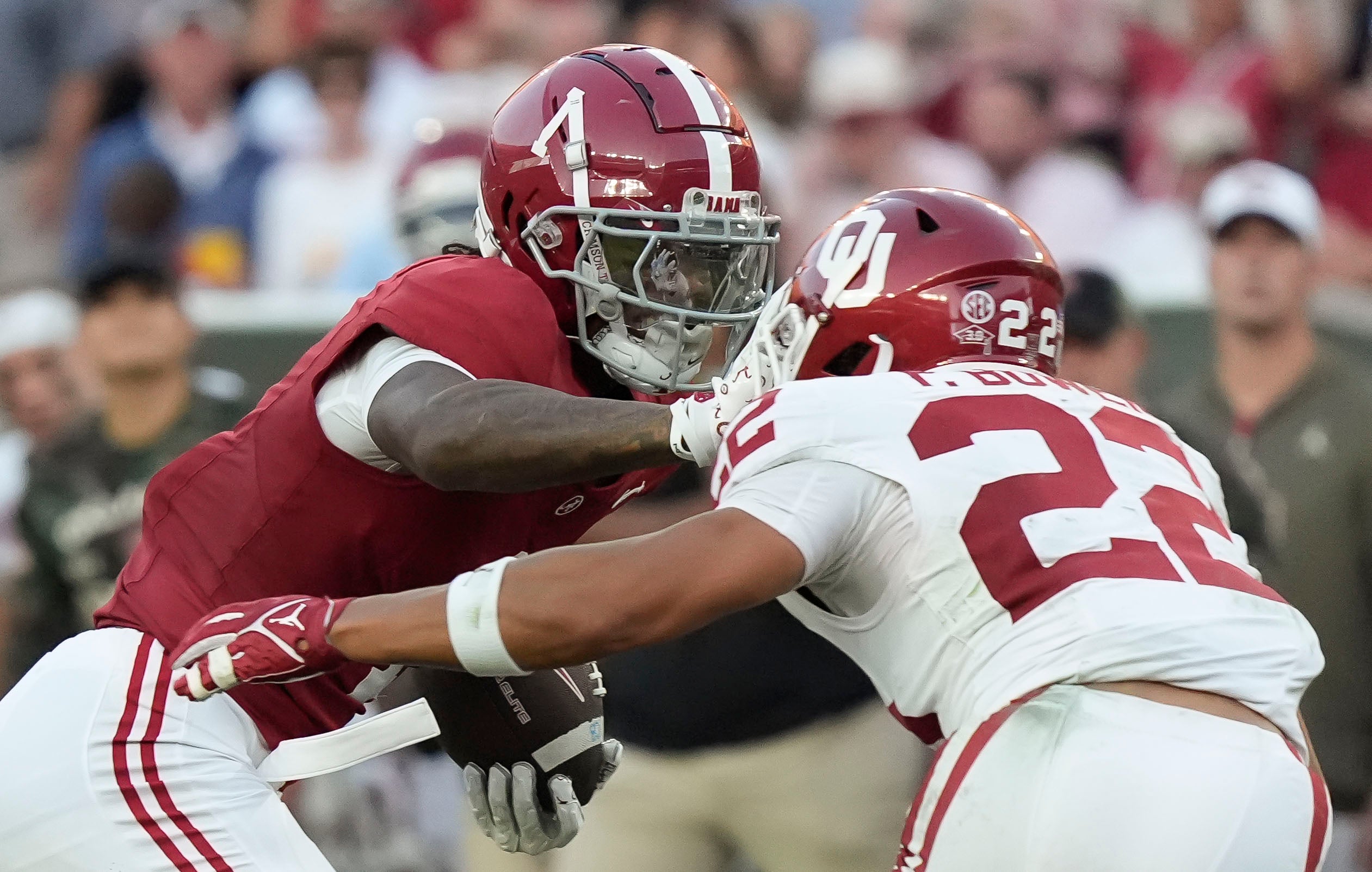 Nov 15, 2025; Tuscaloosa, Alabama, USA; Oklahoma Sooners defensive back Peyton Bowen (22) closes in to make a tackle on Alabama Crimson Tide wide receiver Isaiah Horton (1) at Saban Field at Bryant-Denny Stadium.