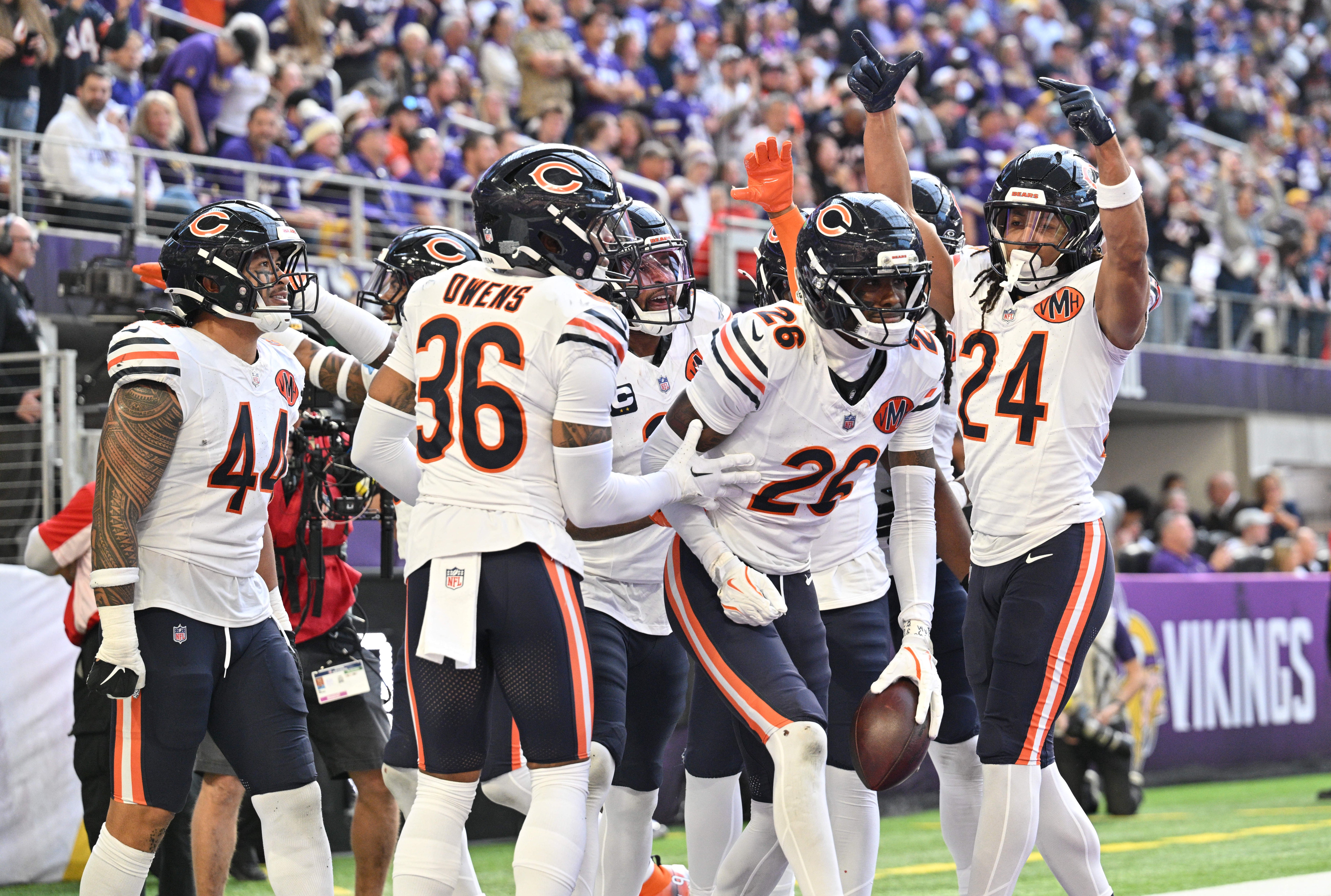 Nov 16, 2025; Minneapolis, Minnesota, USA; Chicago Bears cornerback Nahshon Wright (26) celebrates an interception with teammates during the second quarter against the Minnesota Vikings at U.S. Bank Stadium.
