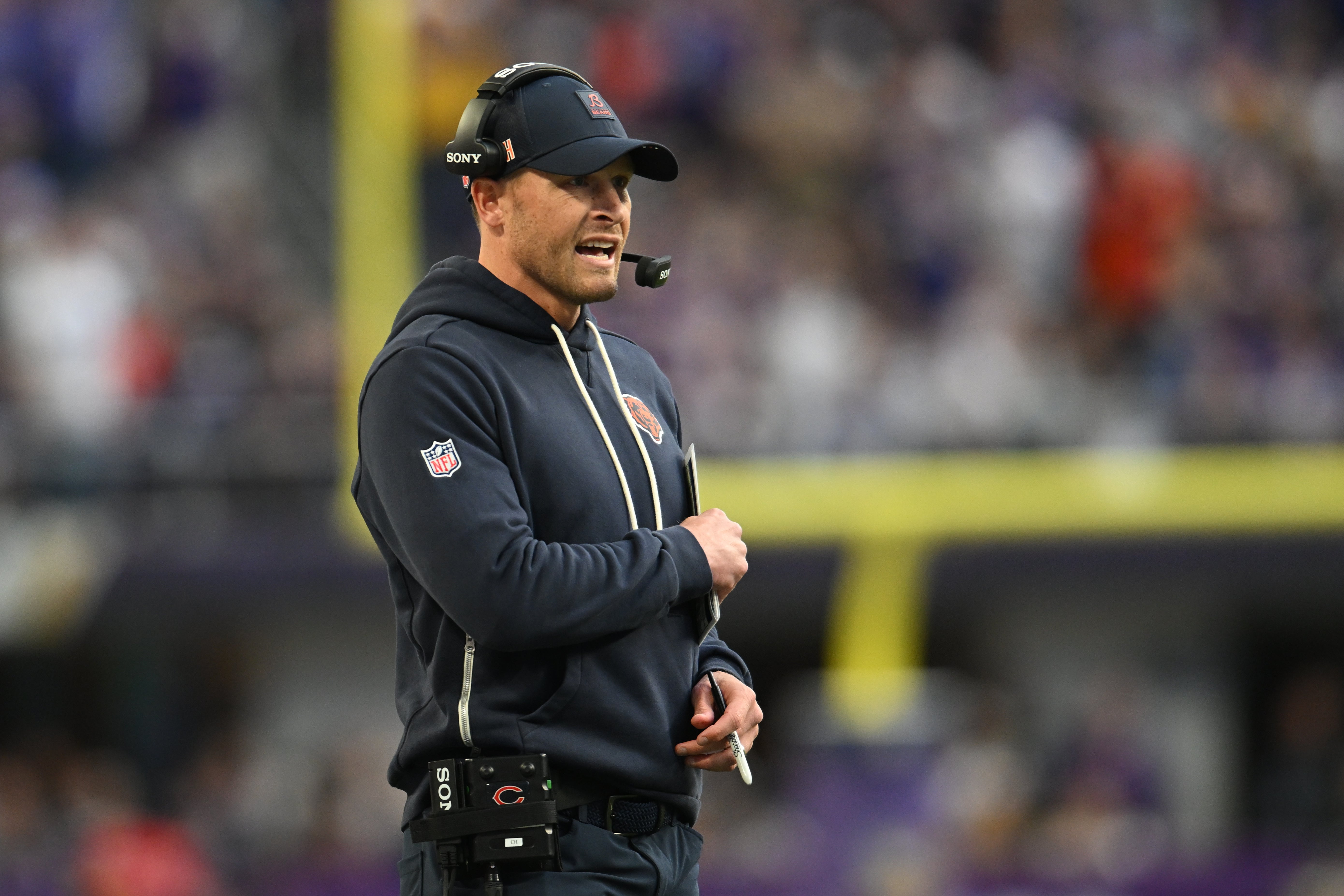 Nov 16, 2025; Minneapolis, Minnesota, USA; Chicago Bears head coach Ben Johnson stands on the sidelines during the fourth quarter against the Minnesota Vikings at U.S. Bank Stadium.