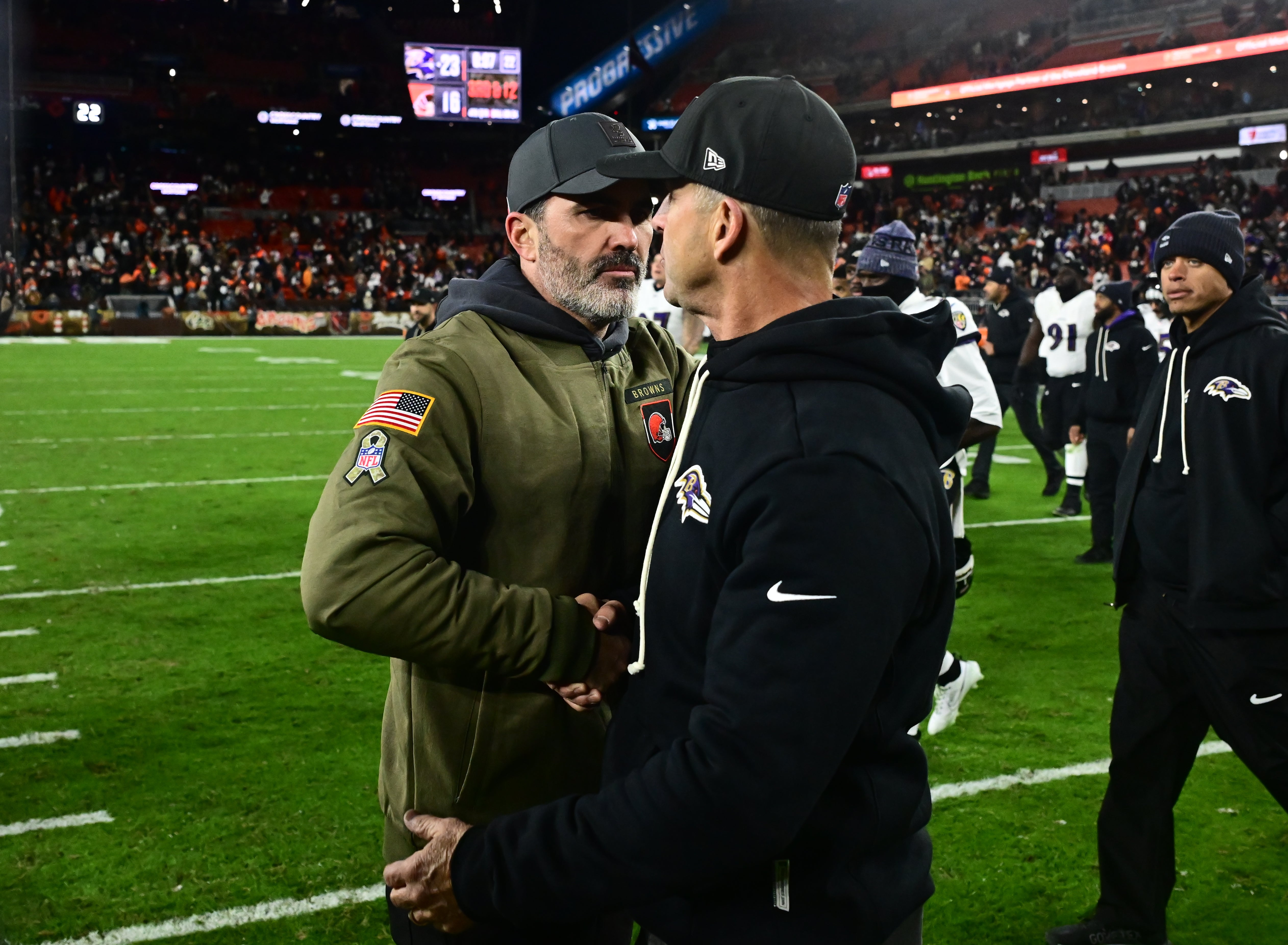 Nov 16, 2025; Cleveland, Ohio, USA; Cleveland Browns head coach Kevin Stefanski shakes hands with Baltimore Ravens head coach John Harbaugh following a game at Huntington Bank Field.