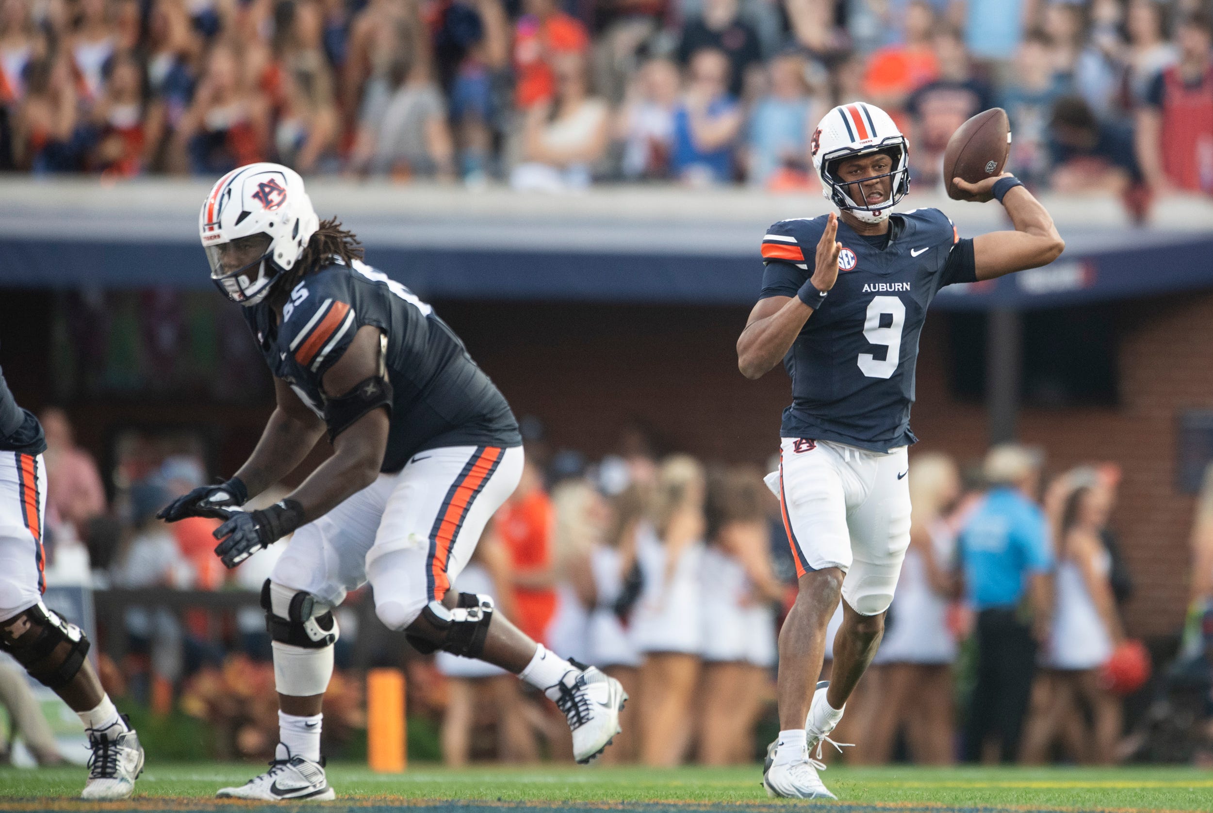 Auburn Tigers quarterback Deuce Knight (9) throws the ball as Auburn Tigers take on Mercer Bears at Jordan-Hare Stadium in Auburn, Ala. on Saturday, Nov. 22, 2025. Auburn Tigers defeated the Mercer Bears 62-17.