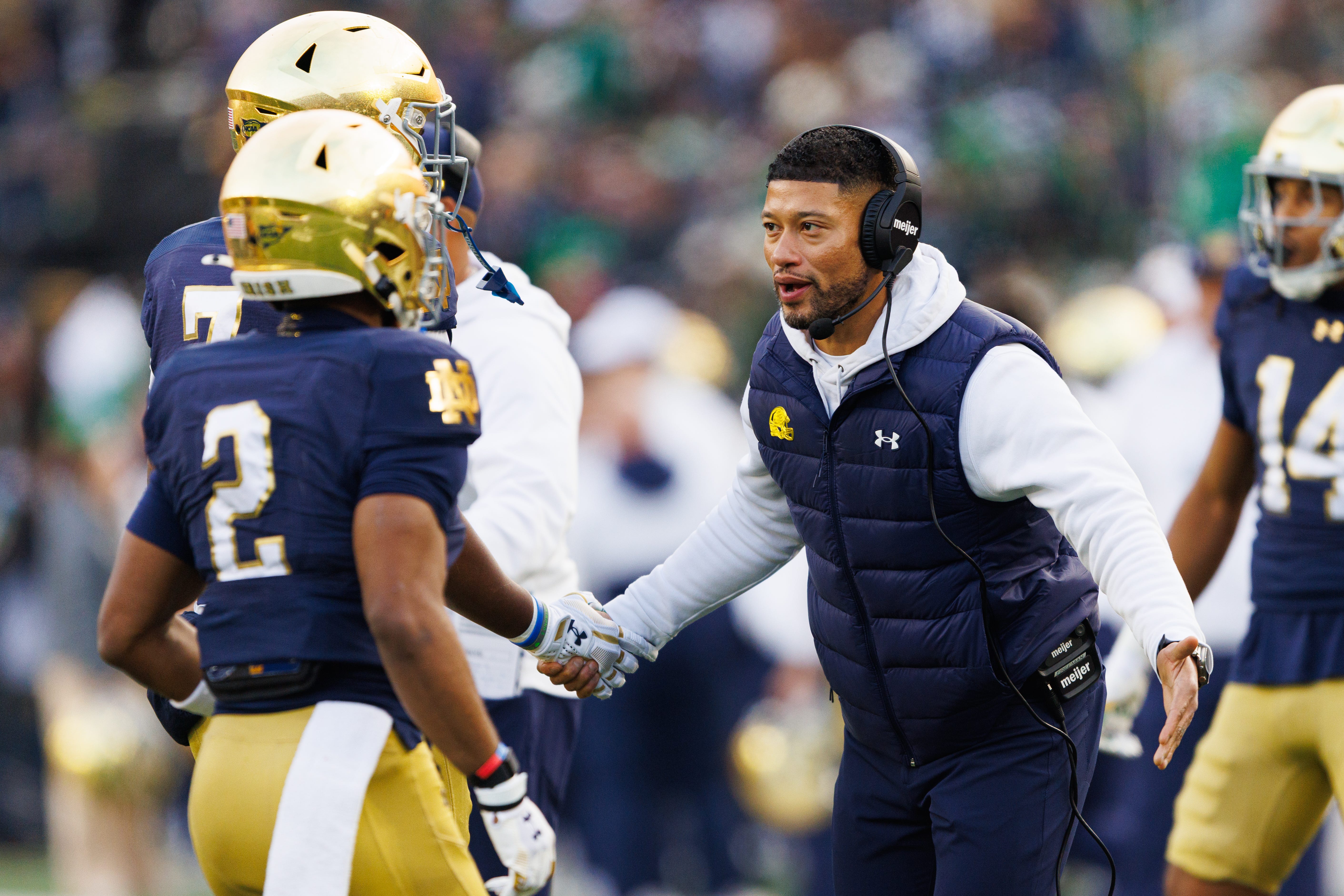 Notre Dame head coach Marcus Freeman celebrates after a touchdown in the first half of a NCAA football game against Syracuse at Notre Dame Stadium on Saturday, Nov. 22, 2025, in South Bend.