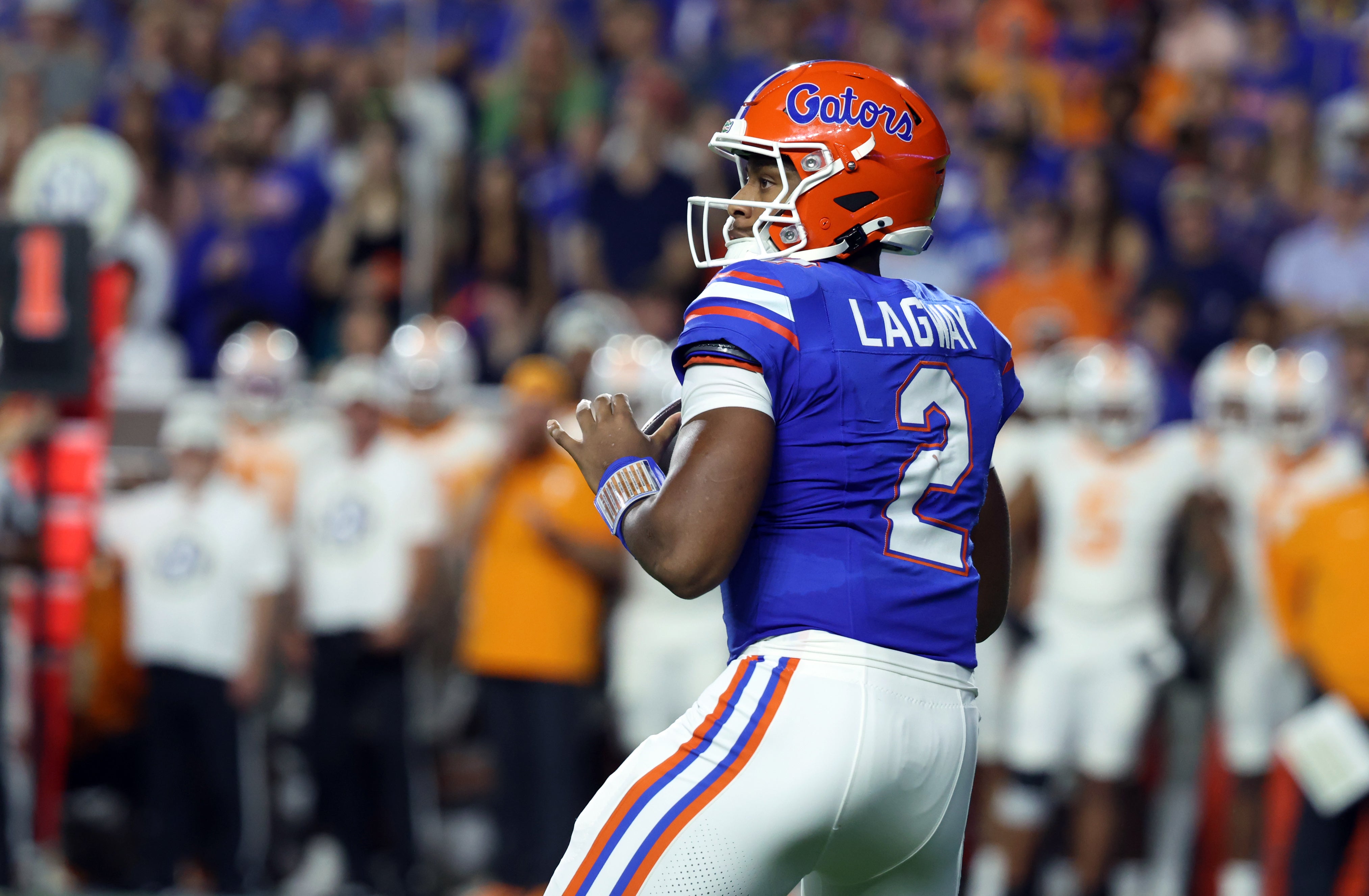 Nov 22, 2025; Gainesville, Florida, USA; Florida Gators quarterback DJ Lagway (2) drops back against the Tennessee Volunteers during the first half at Ben Hill Griffin Stadium.