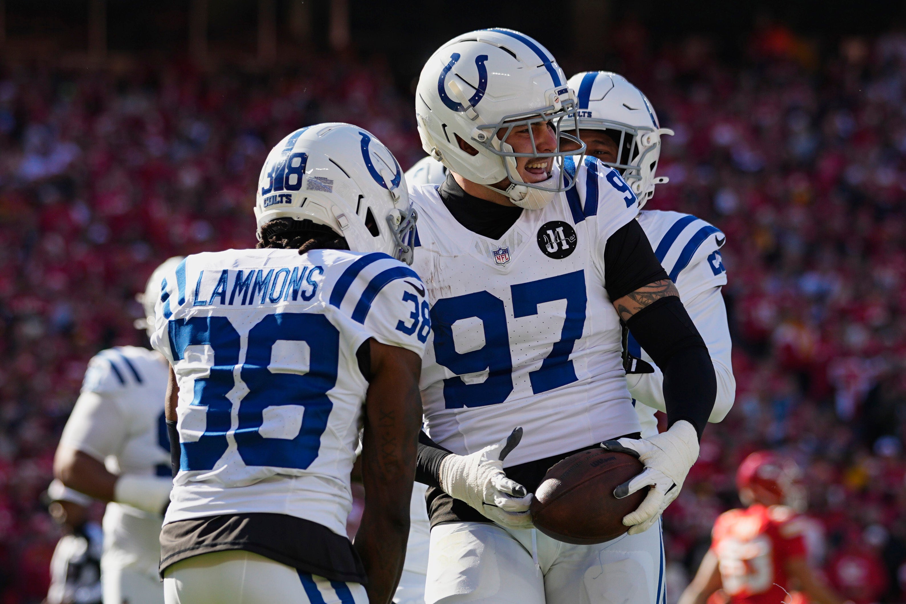 Colts defense celebrates a Laiatu Latu interception