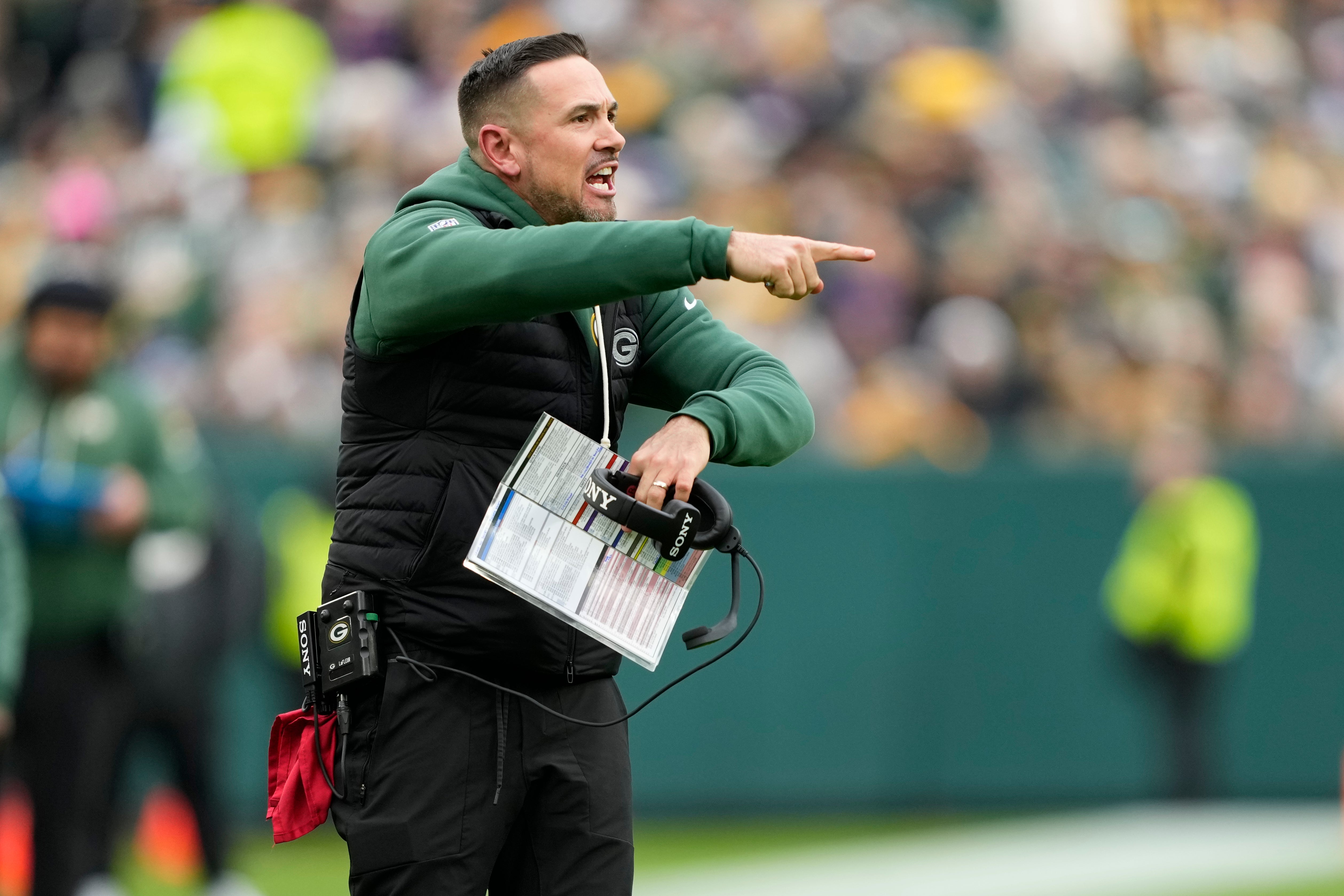 Nov 23, 2025; Green Bay, Wisconsin, USA; Green Bay Packers head coach Matt LaFleur reacts to a penalty call during the first half against the Minnesota Vikings at Lambeau Field.