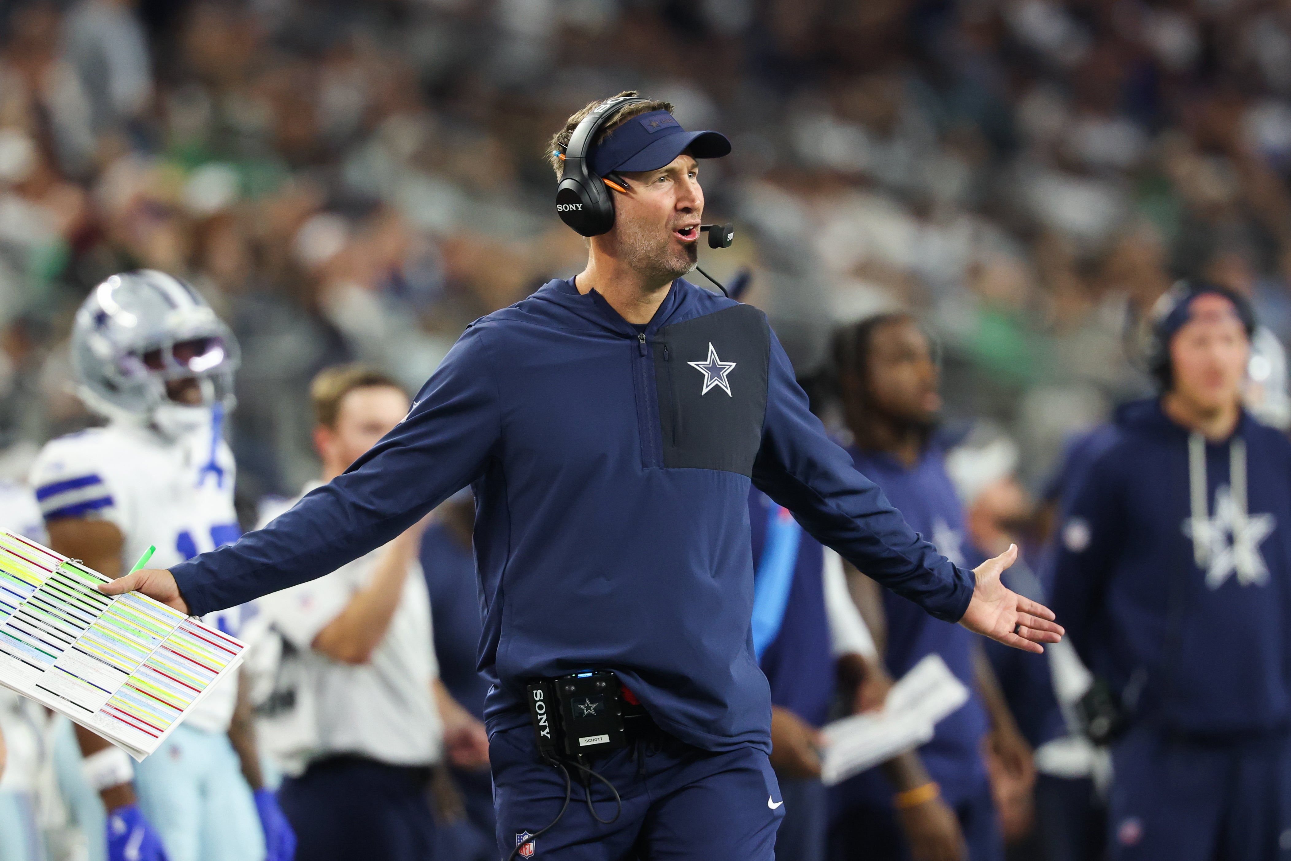Nov 23, 2025; Arlington, Texas, USA; Dallas Cowboys head coach Brian Schottenheimer reacts during the third quarter against the Philadelphia Eagles at AT&T Stadium.