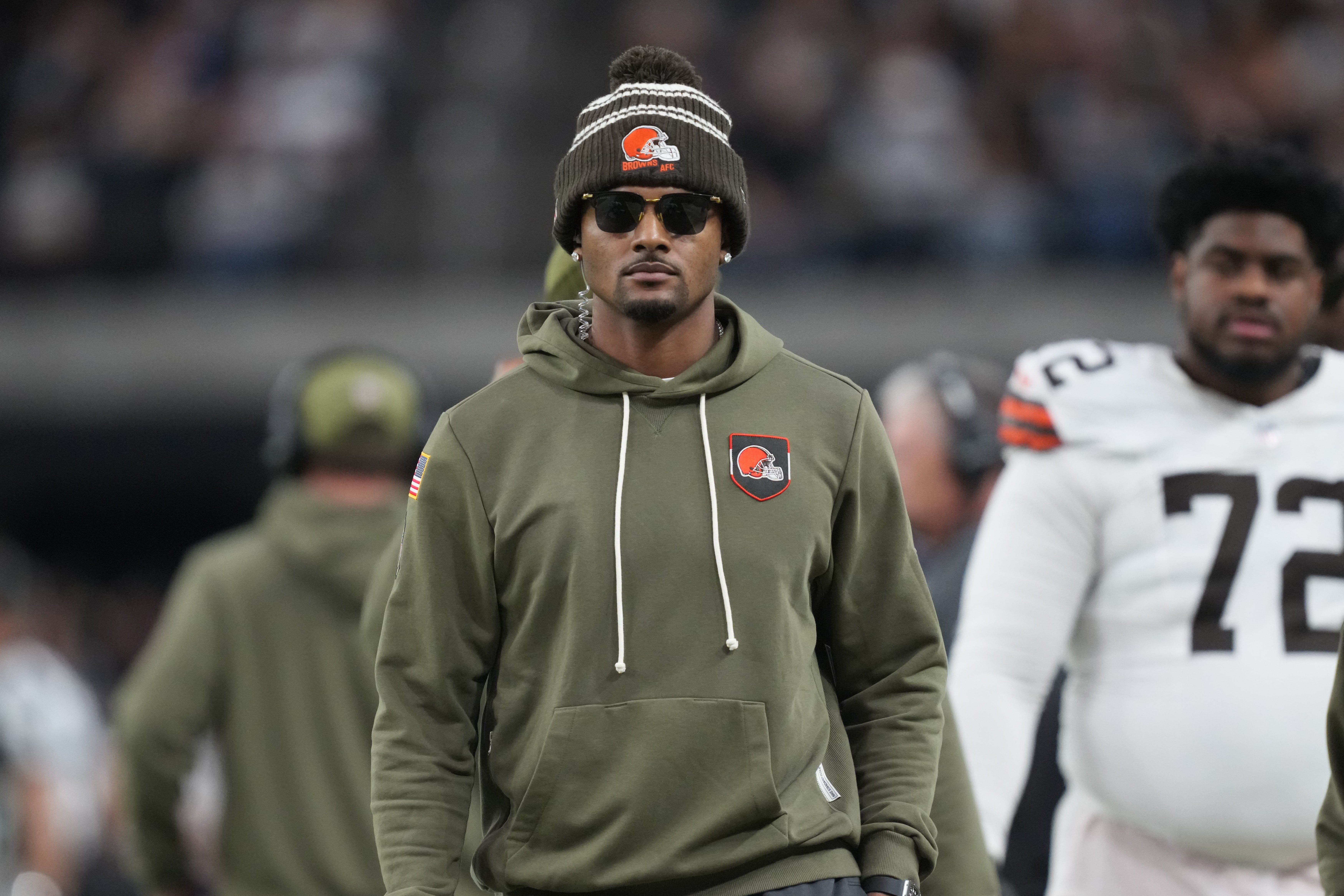 Nov 23, 2025; Paradise, Nevada, USA; Cleveland Browns quarterback Deshaun Watson watches on the sidelines against the Las Vegas Raiders in the second half at Allegiant Stadium