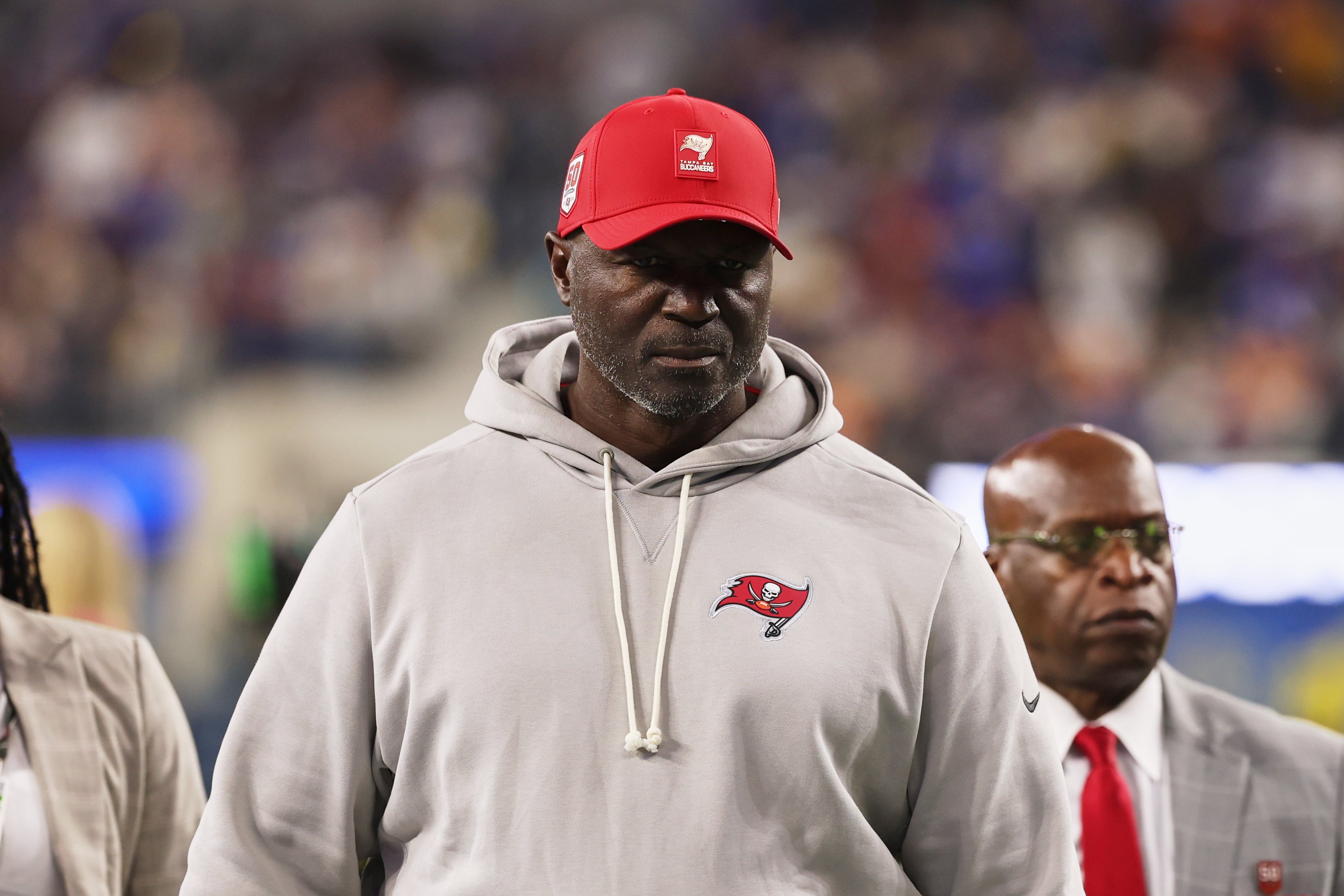 Nov 23, 2025; Inglewood, California, USA; Tampa Bay Buccaneers head coach and defensive coordinator Todd Bowles walks off the field during halftime against the Los Angeles Rams at SoFi Stadium.