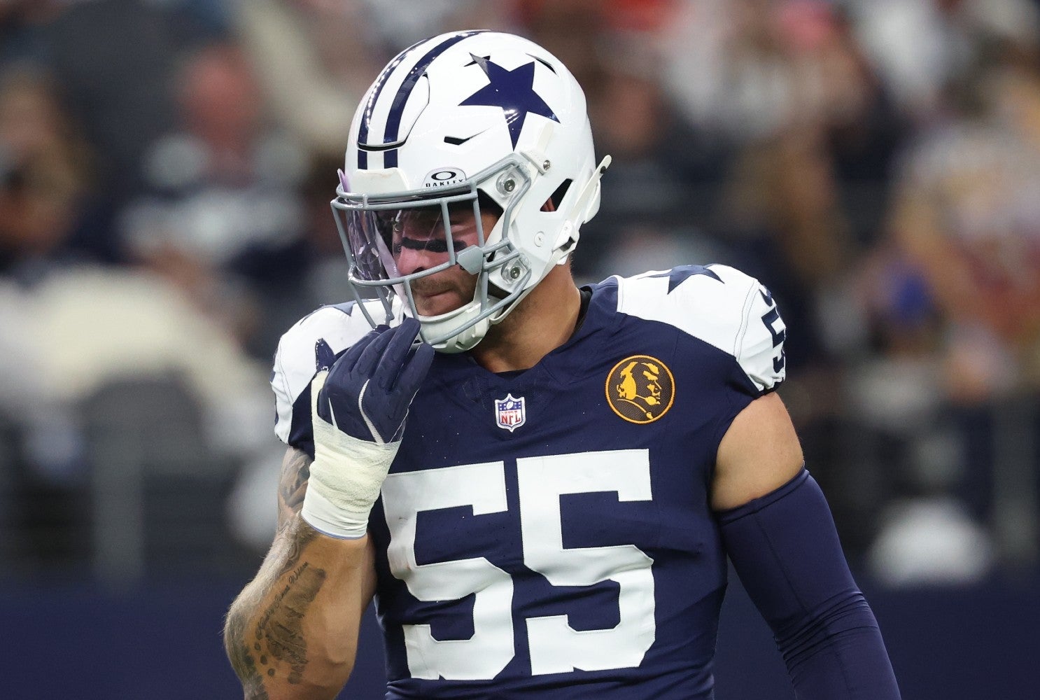 Nov 27, 2025; Arlington, Texas, USA; Dallas Cowboys linebacker Logan Wilson (55) warms up prior to the game against the Kansas City Chiefs at AT&T Stadium.