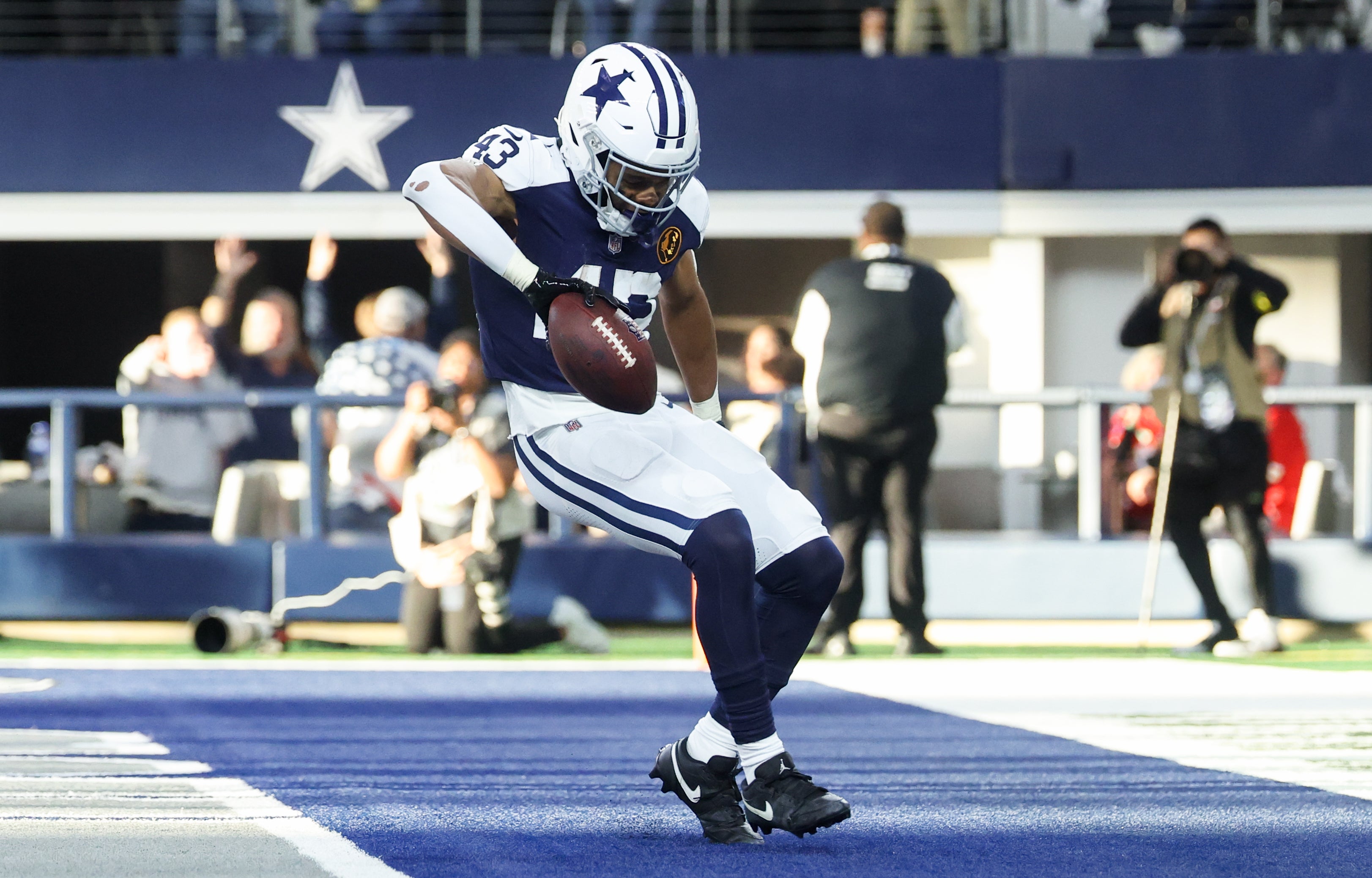 Arlington, Texas, USA; Dallas Cowboys running back Malik Davis (43) celebrates after running for a touchdown against the Kansas City Chiefs during the second quarter at AT&T Stadium.