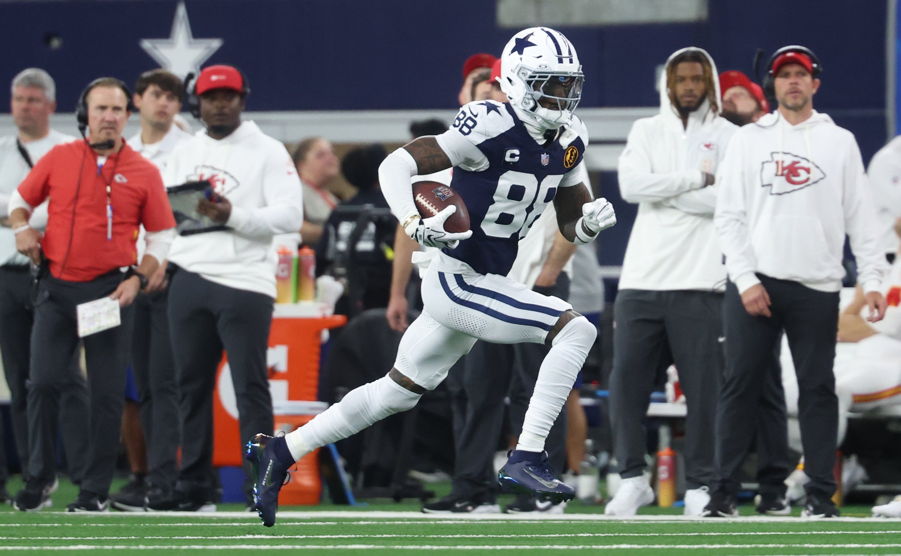 Nov 27, 2025; Arlington, Texas, USA; Dallas Cowboys wide receiver CeeDee Lamb (88) runs after a catch against the Kansas City Chiefs during the second quarter at AT&T Stadium.