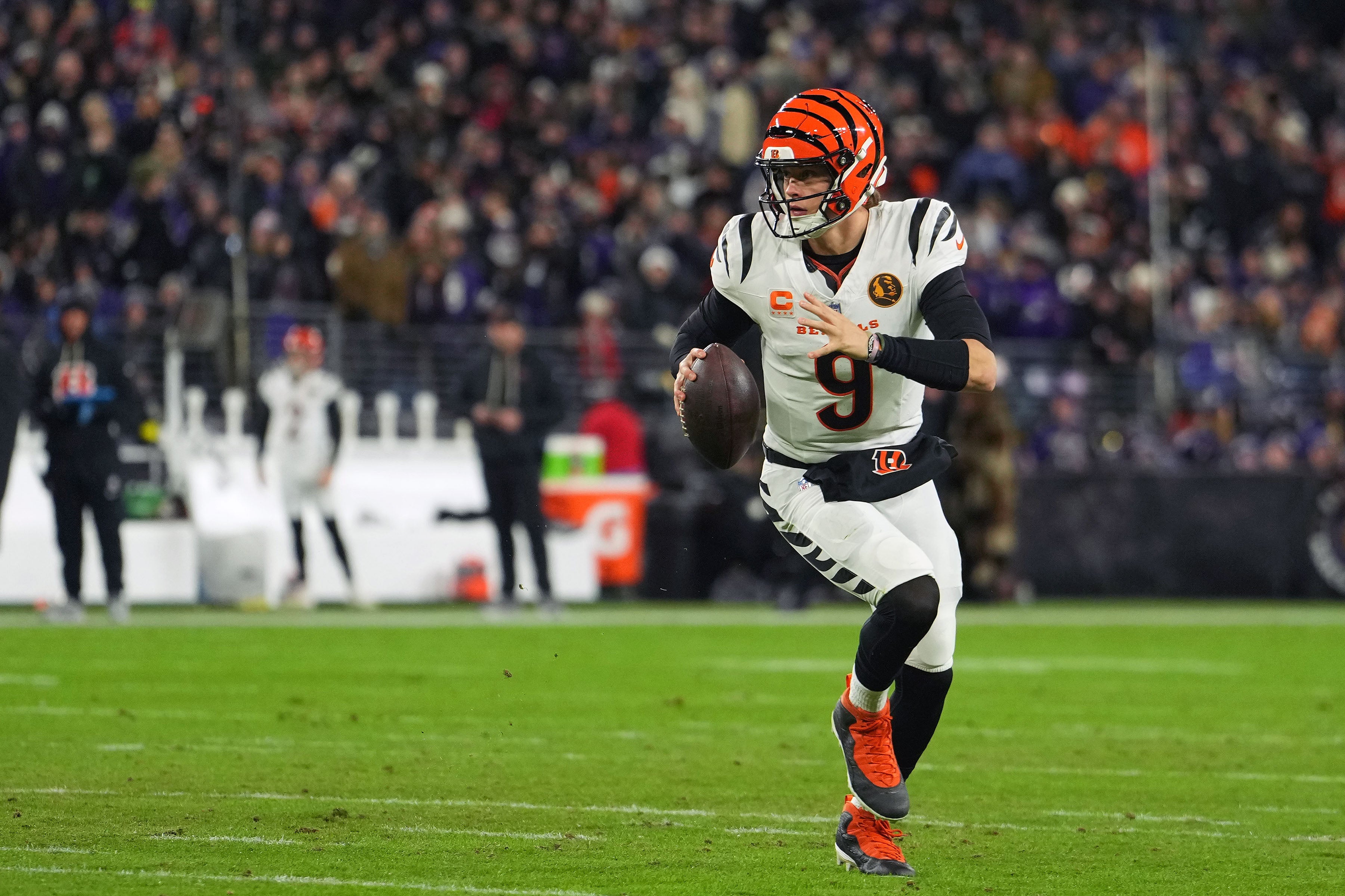 Nov 27, 2025; Baltimore, Maryland, USA; Cincinnati Bengals quarterback Joe Burrow (9) drops back to pass against the Baltimore Ravens during the first half at M&T Bank Stadium.