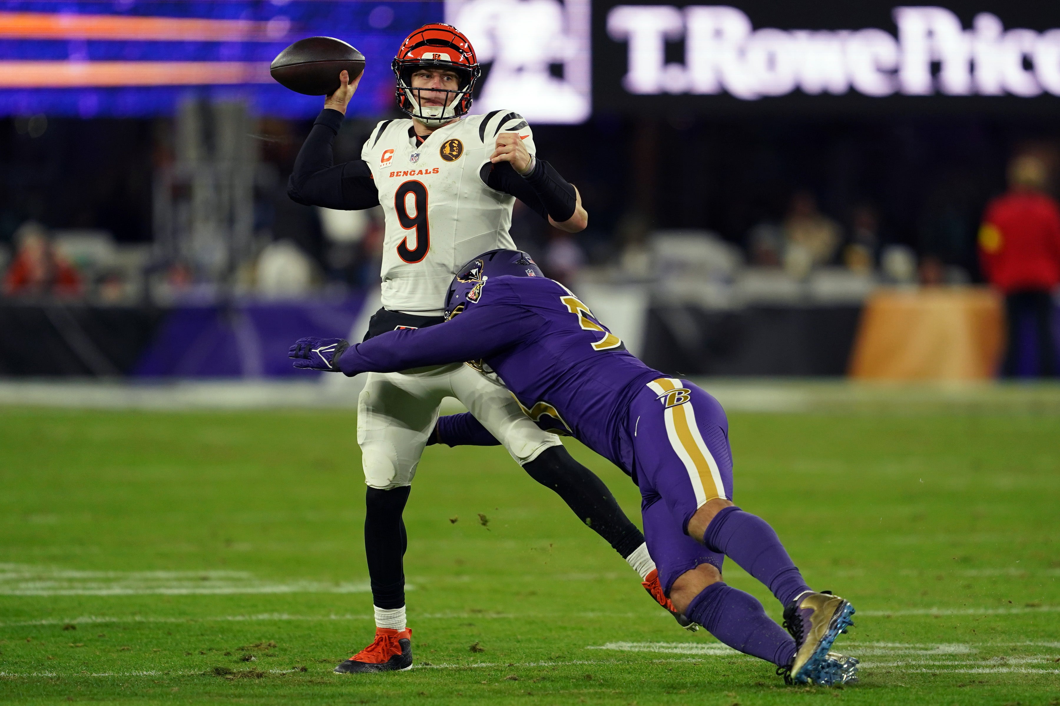 Nov 27, 2025; Baltimore, Maryland, USA; Cincinnati Bengals quarterback Joe Burrow (9) throws pass against Baltimore Ravens linebacker Kyle Van Noy (53) during the second half at M&T Bank Stadium.