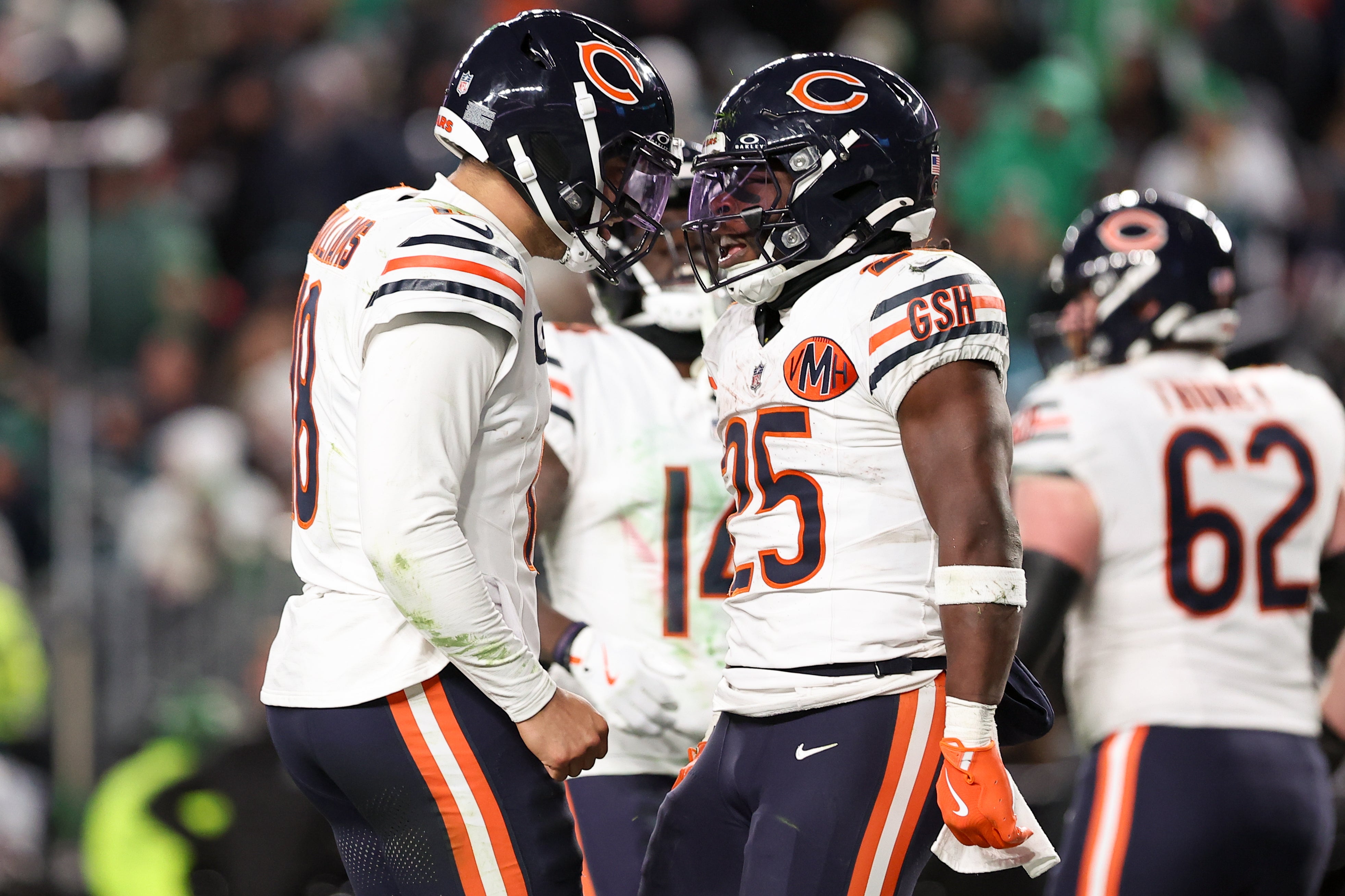 Nov 28, 2025; Philadelphia, Pennsylvania, USA; Chicago Bears quarterback Caleb Williams (18) and running back Kyle Monangai (25) celebrate after scoring a touchdown against the Philadelphia Eagles during the fourth quarter of the game at Lincoln Financial Field.