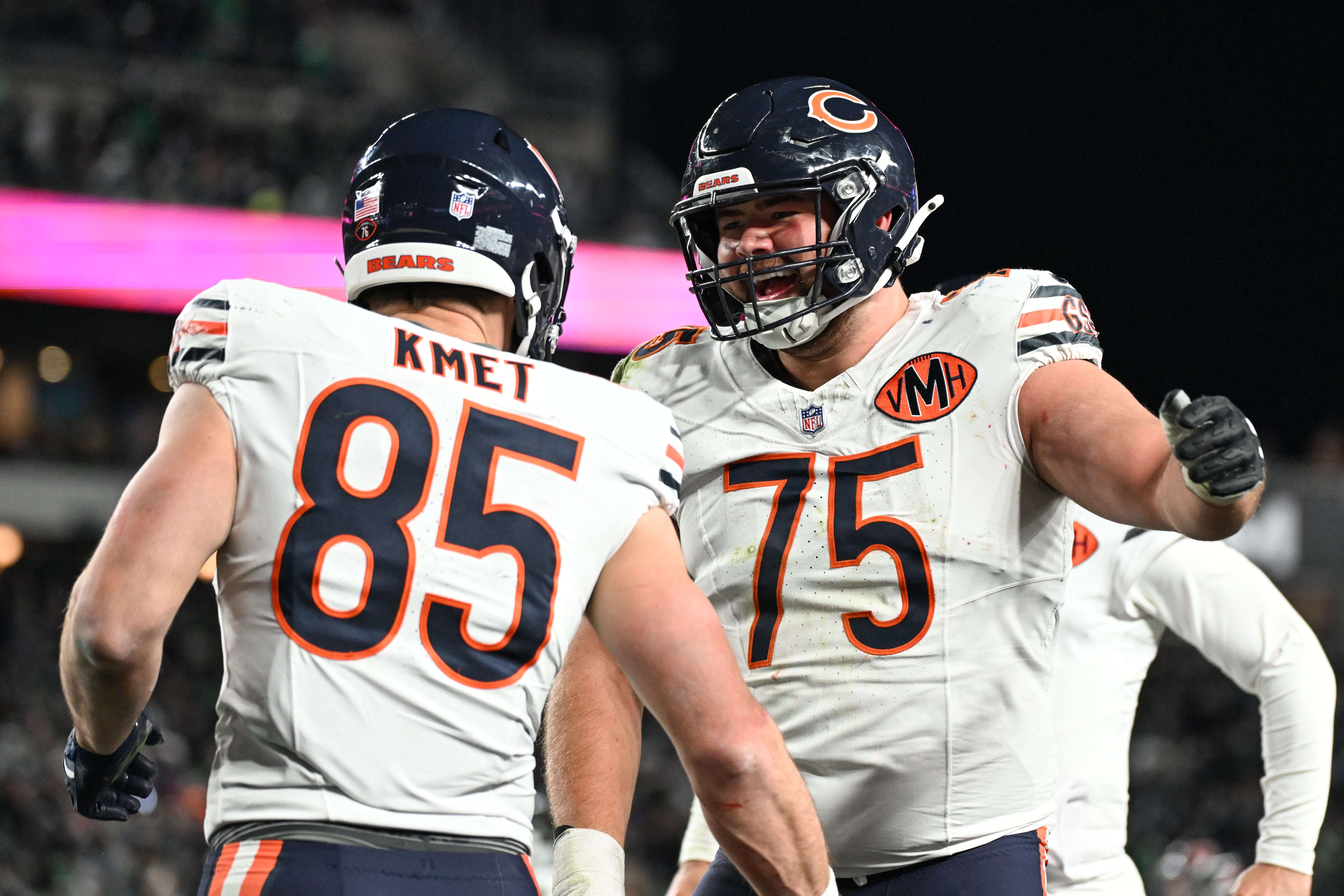 Nov 28, 2025; Philadelphia, Pennsylvania, USA; Chicago Bears tight end Cole Kmet (85) celebrates after scoring a touchdown against the Philadelphia Eagles with offensive tackle Ozzy Trapilo (75) during the fourth quarter of the game at Lincoln Financial Field.