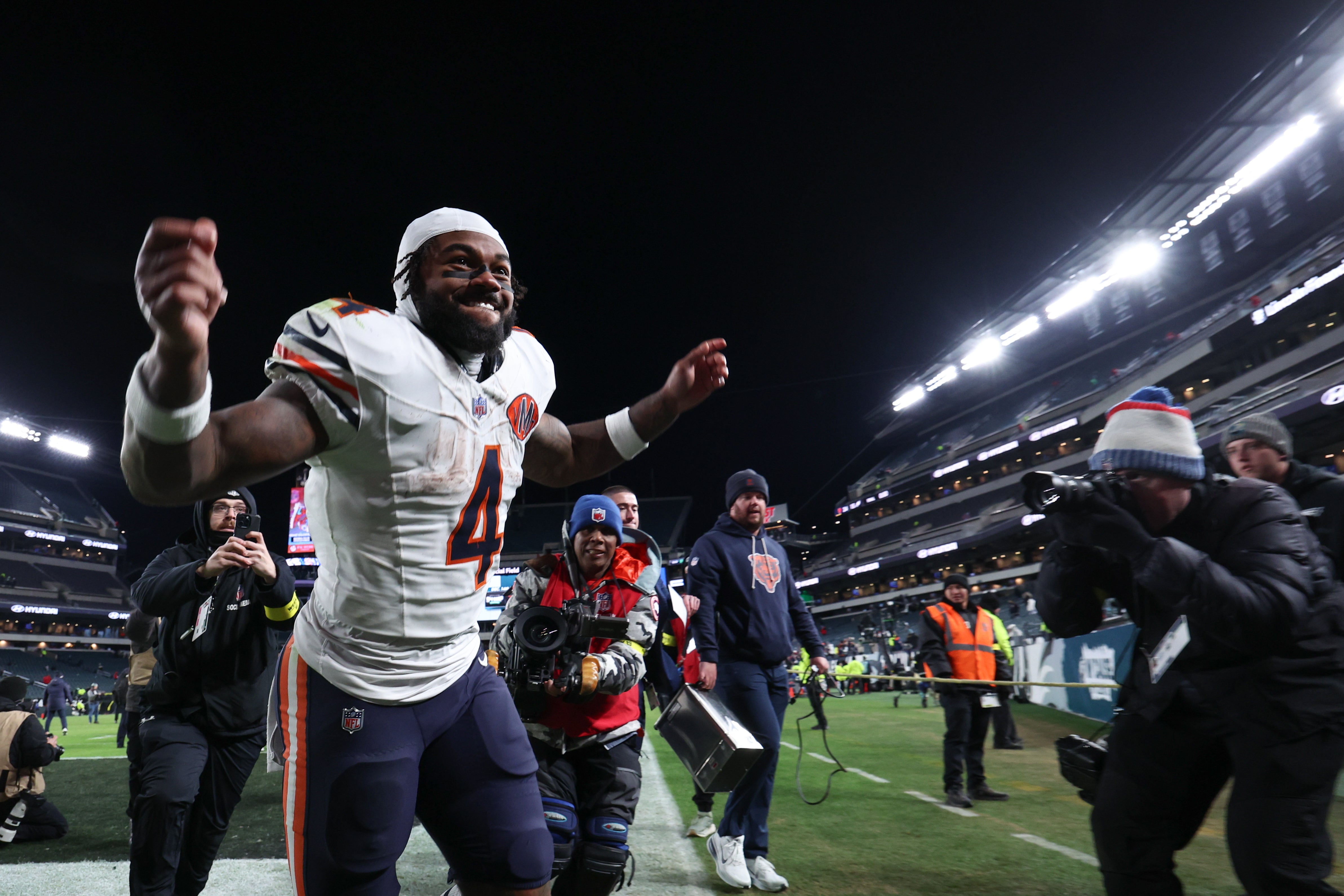 Nov 28, 2025; Philadelphia, Pennsylvania, USA; Chicago Bears running back D'Andre Swift (4) celebrates as he leaves the field after the game against the Philadelphia Eagles at Lincoln Financial Field.