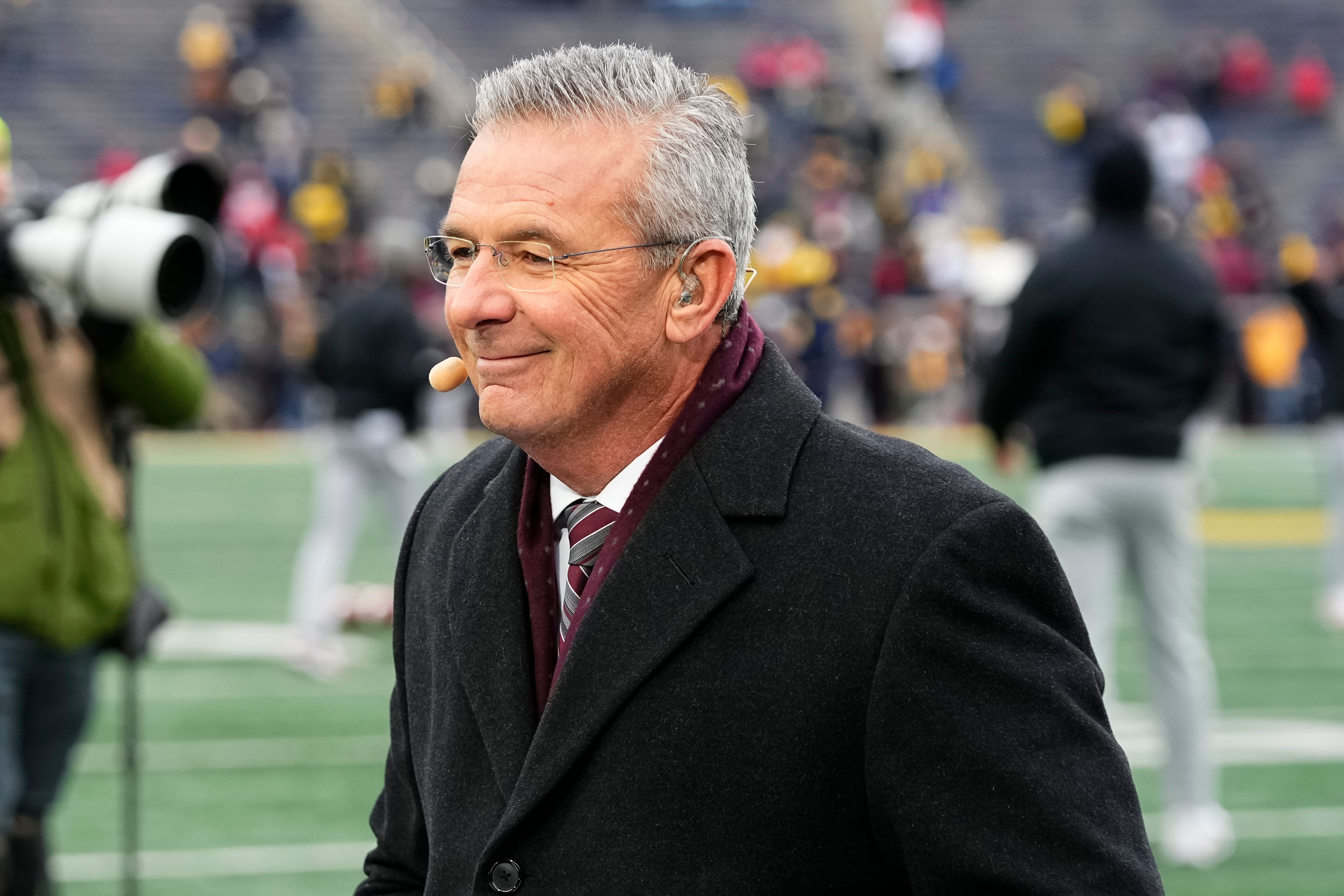 Former Ohio State Buckeyes head coach Urban Meyer broadcasts on Fox's Big Noon Kickoff prior to the NCAA football game between the Buckeyes and the Michigan Wolverines at Michigan Stadium in Ann Arbor, Mich. on Nov. 29, 2025.