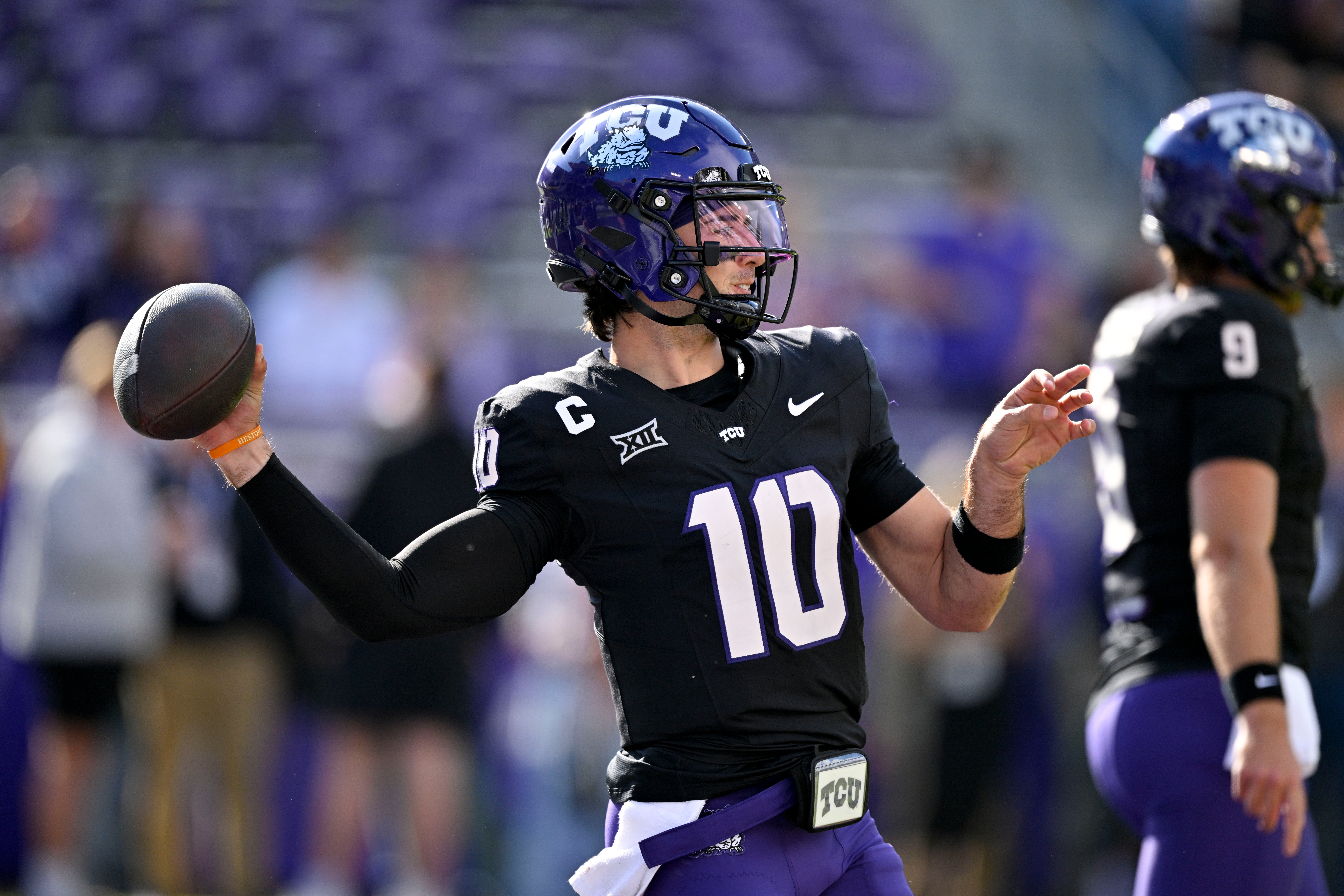 Nov 29, 2025; Fort Worth, Texas, USA; TCU Horned Frogs quarterback Josh Hoover (10) warms up before the game against the Cincinnati Bearcats at Amon G. Carter Stadium. Mandatory Credit: Jerome Miron-Imagn Images