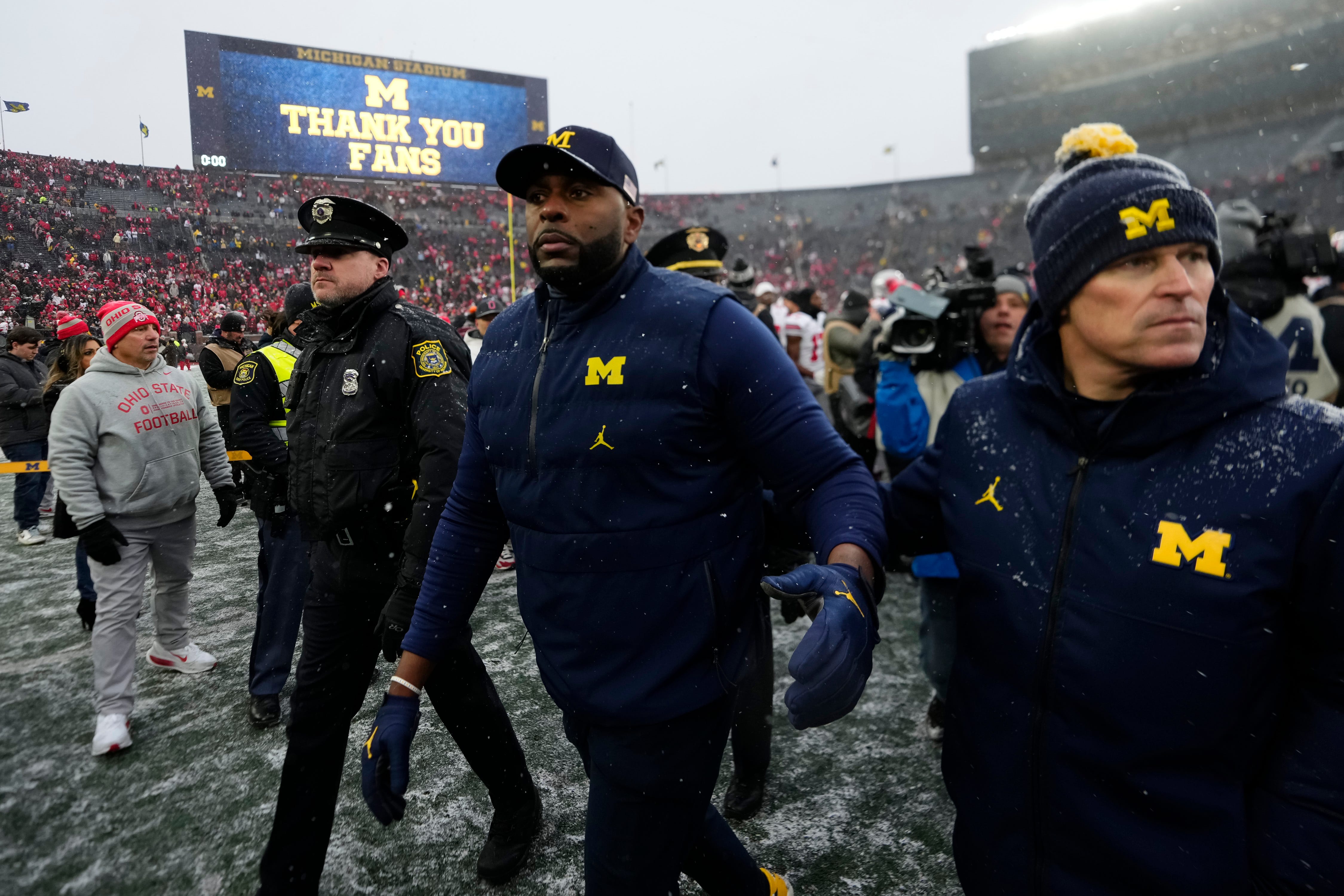 Michigan Wolverines head coach Sherrone Moore leaves the field following the NCAA football game against the Ohio State Buckeyes at Michigan Stadium in Ann Arbor, Mich. on Nov. 29, 2025. Ohio State won 27-9.