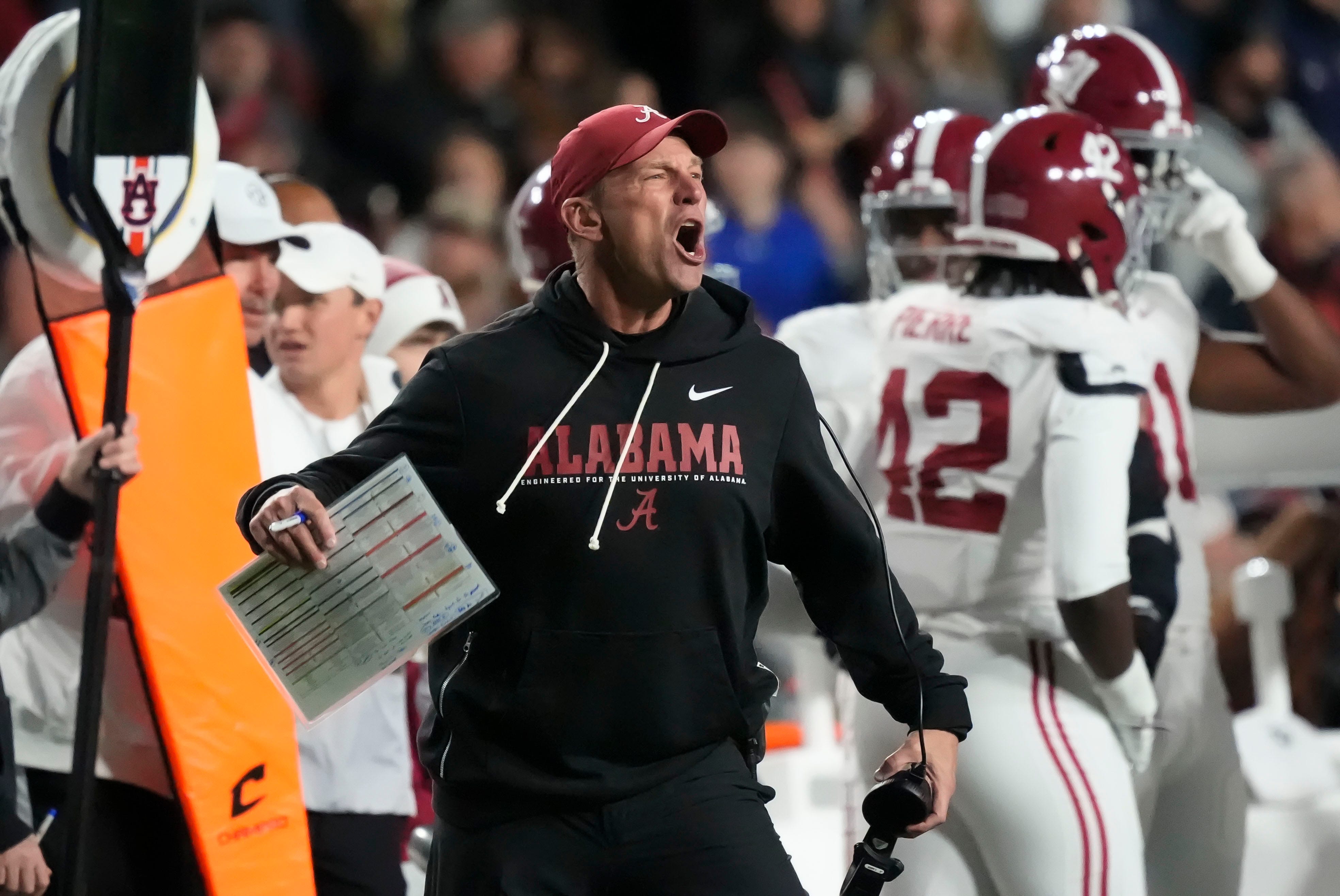 Nov 29, 2025; Auburn, Alabama, USA; Alabama head coach Kalen DeBoer protests a personal foul call against the Crimson Tide during the game with Auburn at Jordan-Hare Stadium.