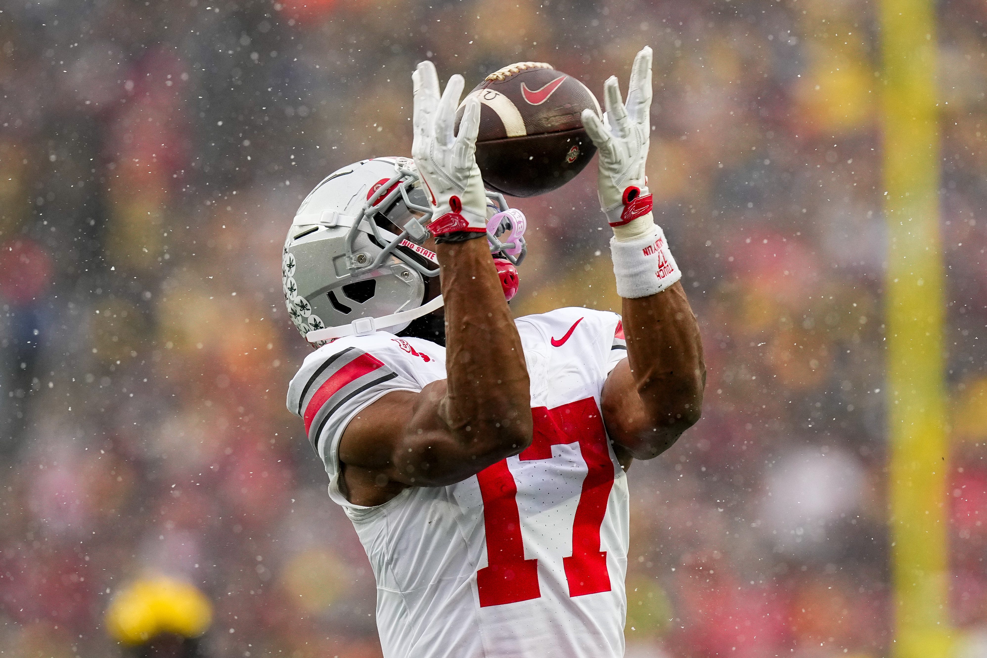 Ohio State Buckeyes wide receiver Carnell Tate (17) catches a pass against the Michigan Wolverines in the second half of the NCAA football game at Michigan Stadium on Saturday, Nov. 29, 2025 in Ann Arbor, Michigan.