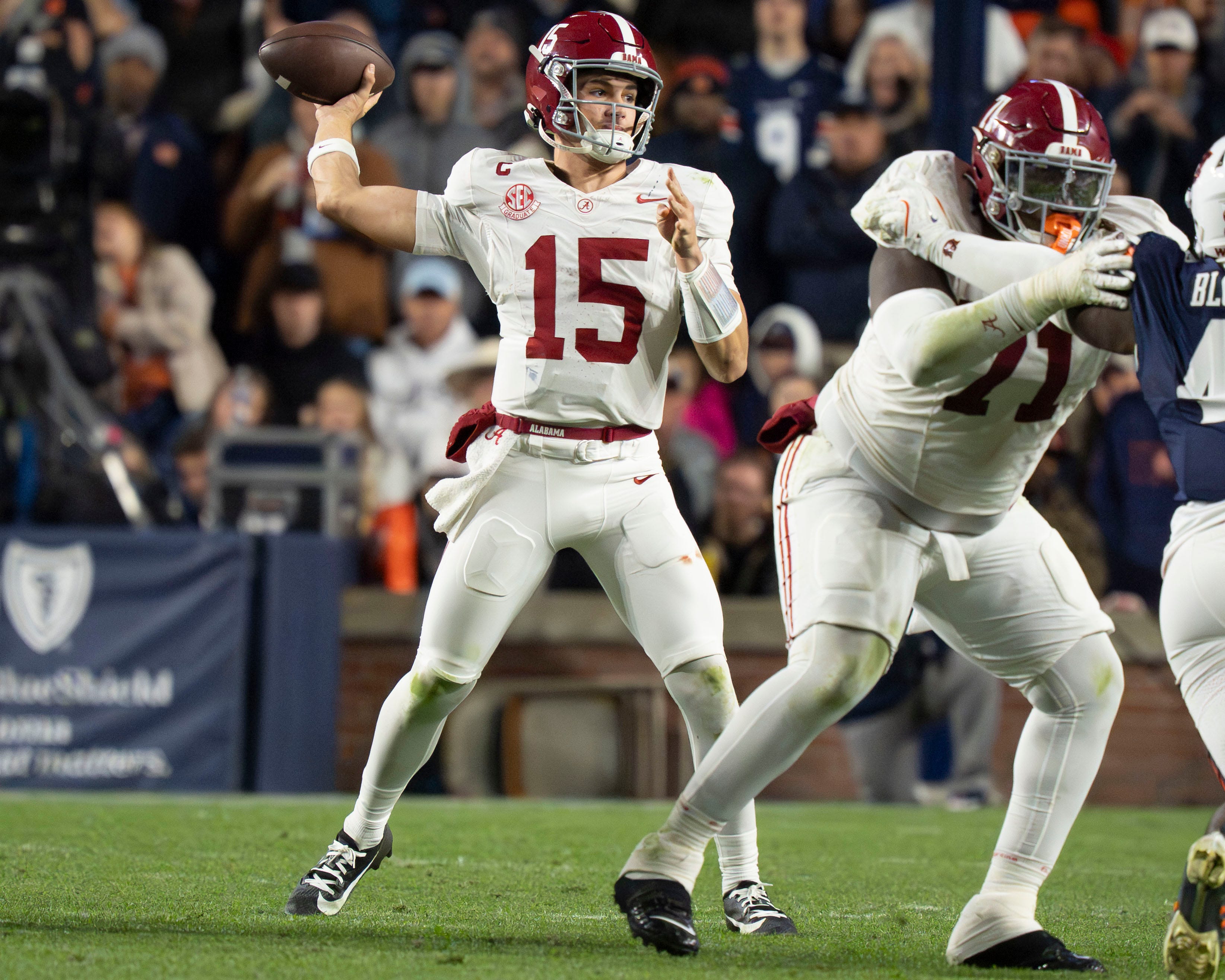 Nov 29, 2025; Auburn, Alabama, USA; Alabama quarterback Ty Simpson (15) throws a pass at Jordan-Hare Stadium. Alabama defeated Auburn 27-20. Mandatory Credit: Gary Cosby Jr.-Tuscaloosa News