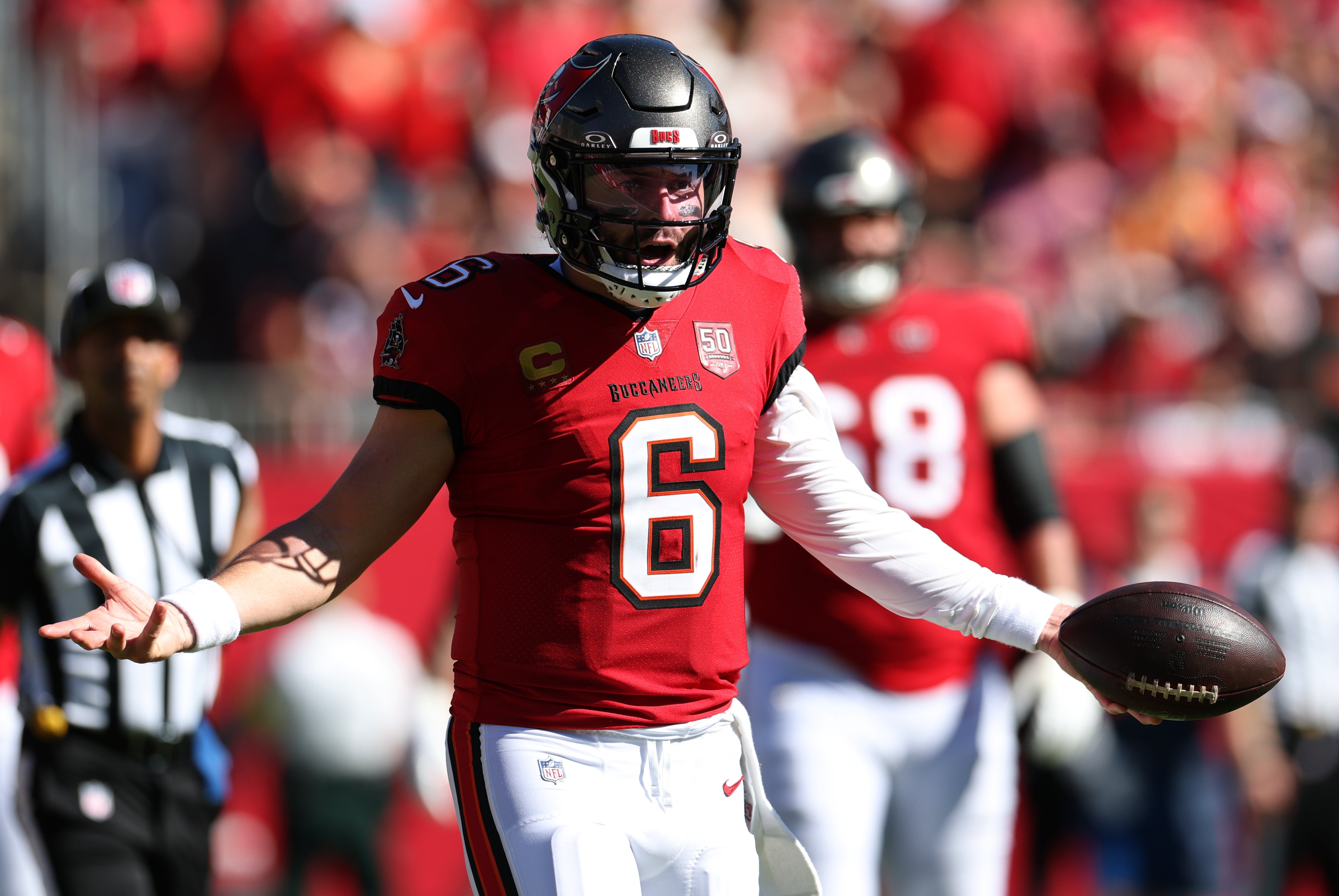 Nov 30, 2025; Tampa, Florida, USA; Tampa Bay Buccaneers quarterback Baker Mayfield (6) reacts after a play during the first half against the Arizona Cardinals at Raymond James Stadium.