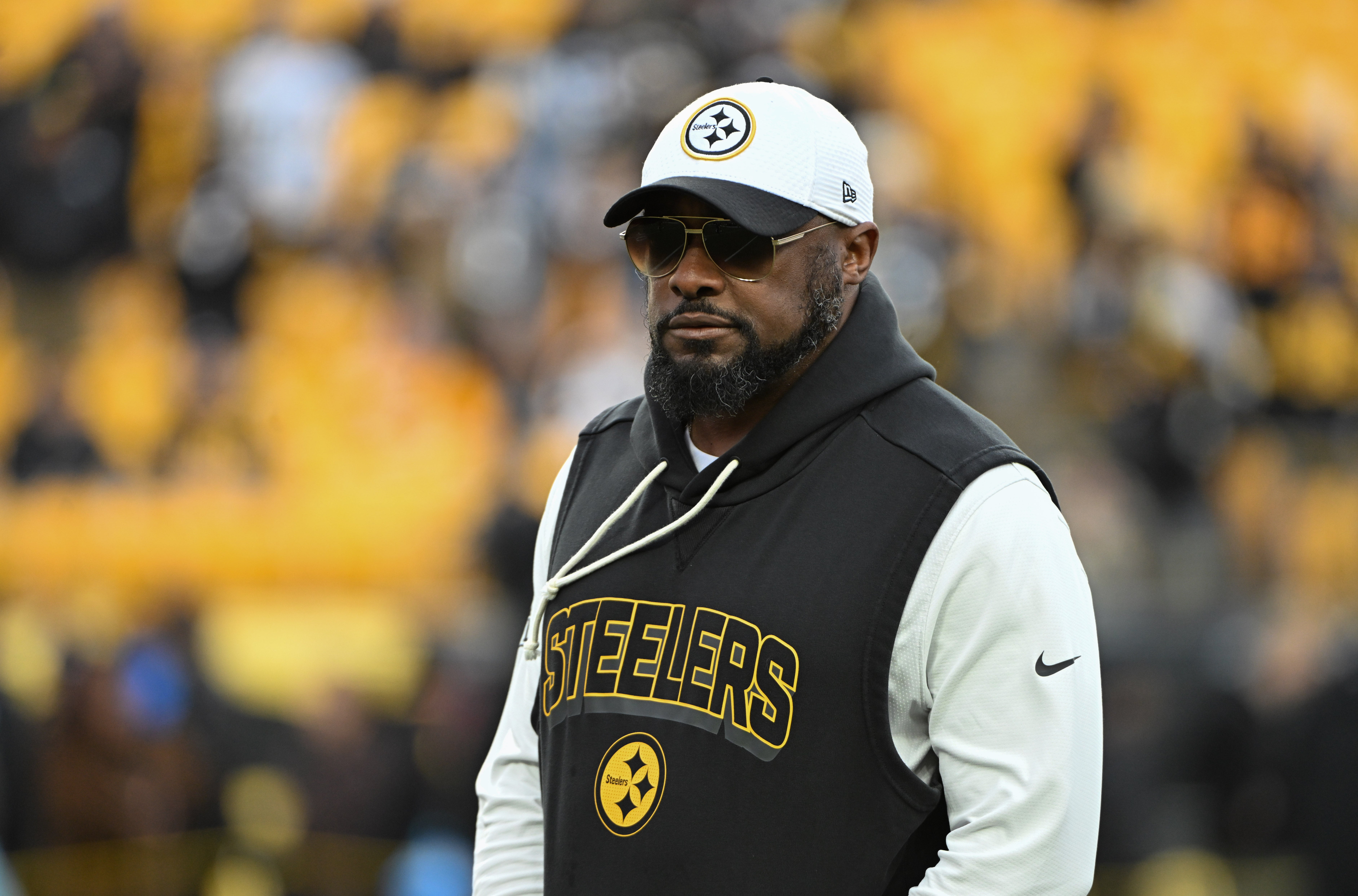 Nov 30, 2025; Pittsburgh, Pennsylvania, USA; Pittsburgh Steelers head coach Mike Tomlin warms up for a game against the Buffalo Bills at Acrisure Stadium.