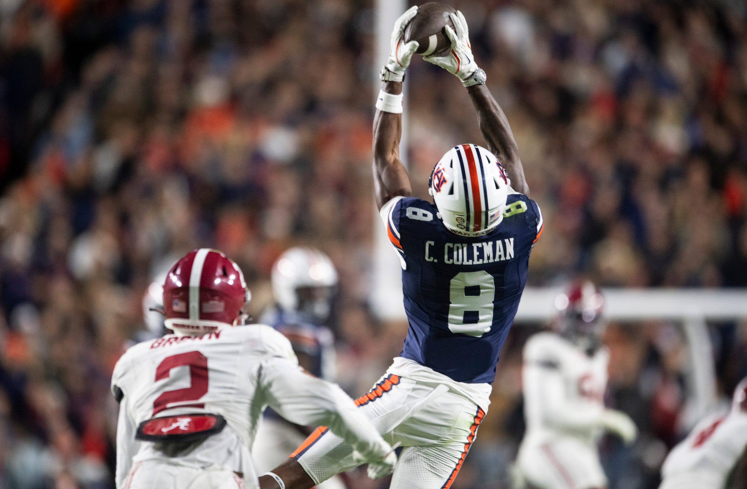 Auburn Tigers wide receiver Cam Coleman (8) catches a pass as Auburn Tigers take on Alabama Crimson Tide in the Iron Bowl at Jordan-Hare Stadium in Auburn, Ala. on Saturday, Nov. 29, 2025. Alabama Crimson Tide defeated Auburn Tigers 27-20.