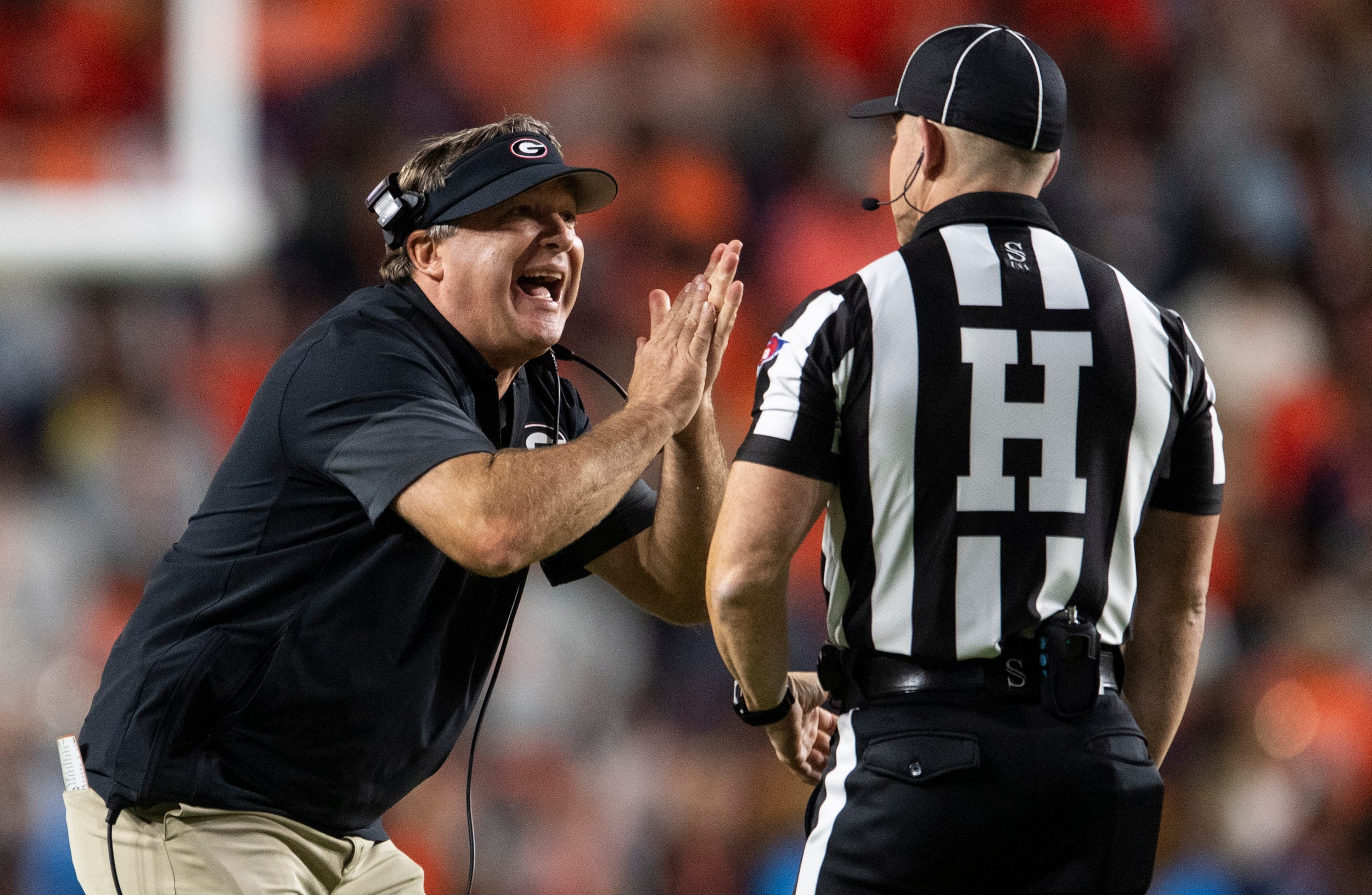 Georgia Bulldogs head coach Kirby Smart complains about a inadvertent time out call as Auburn Tigers take on Georgia Bulldogs at Jordan-Hare Stadium in Auburn, Ala. on Saturday, Oct. 11, 2025. Georgia Bulldogs defeated Auburn Tigers 20-10.