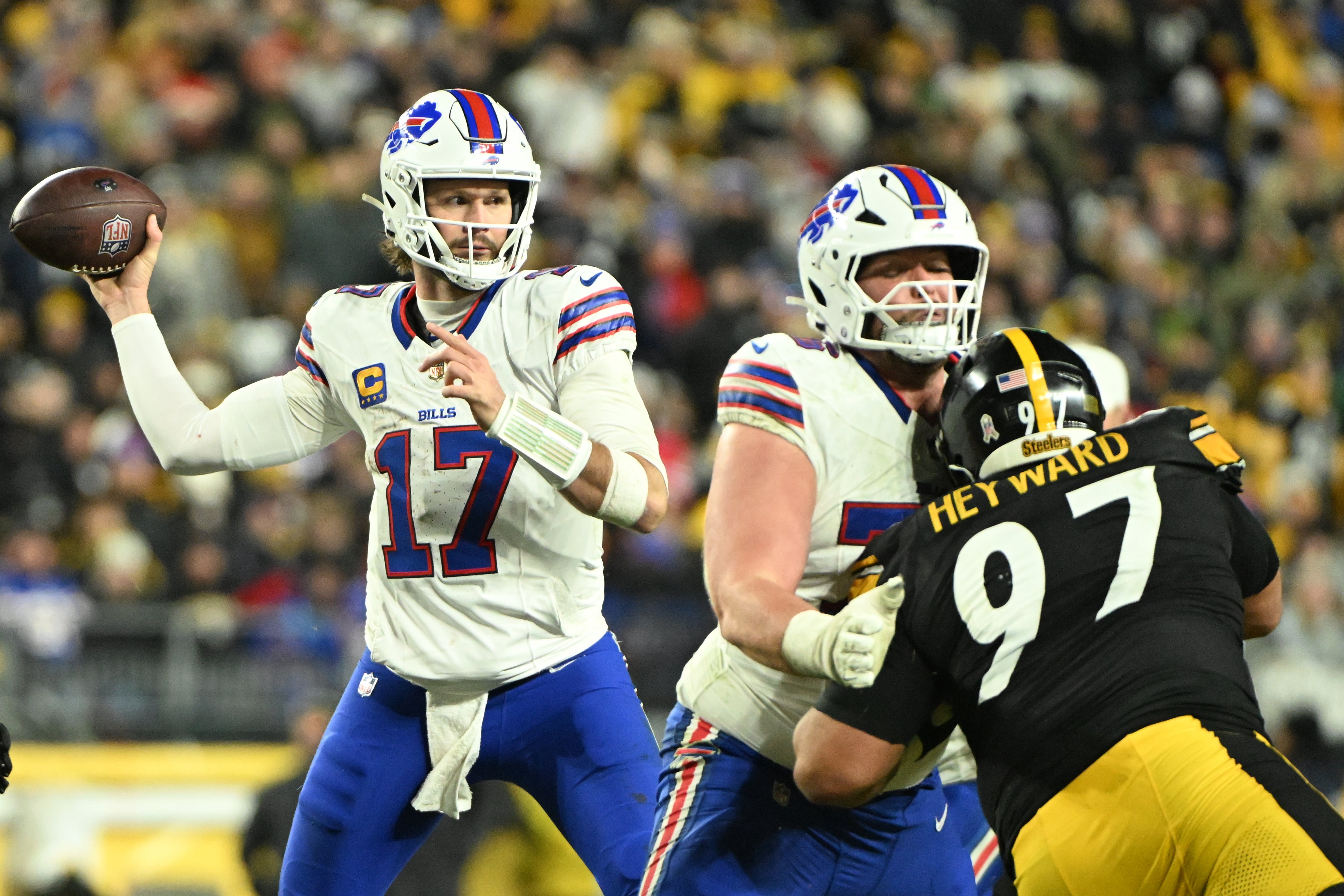 Nov 30, 2025; Pittsburgh, Pennsylvania, USA; Buffalo Bills quarterback Josh Allen (17) looks to pass during the third quarter against the Pittsburgh Steelers at Acrisure Stadium.