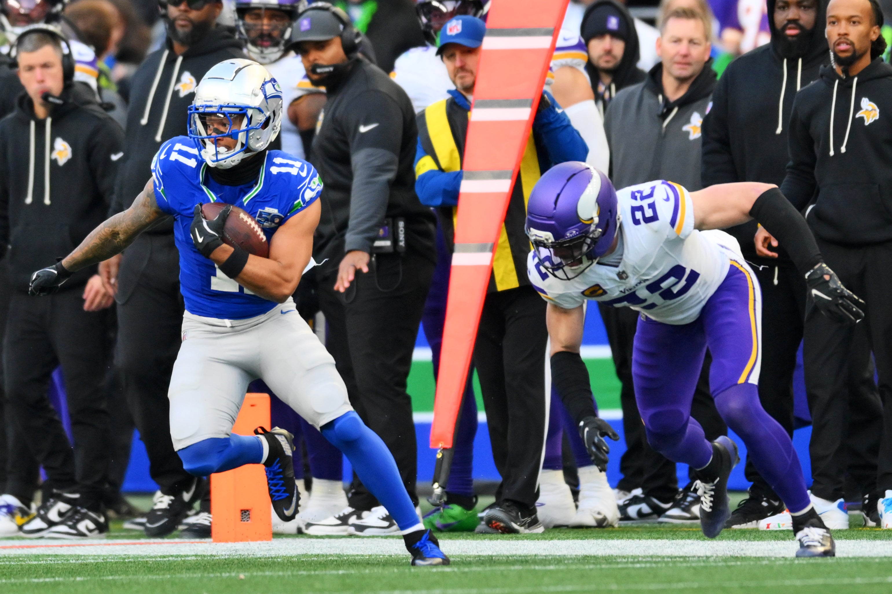 Nov 30, 2025; Seattle, Washington, USA; Seattle Seahawks wide receiver Jaxon Smith-Njigba (11) runs the ball after a catch during the second half against the Minnesota Vikings at Lumen Field.