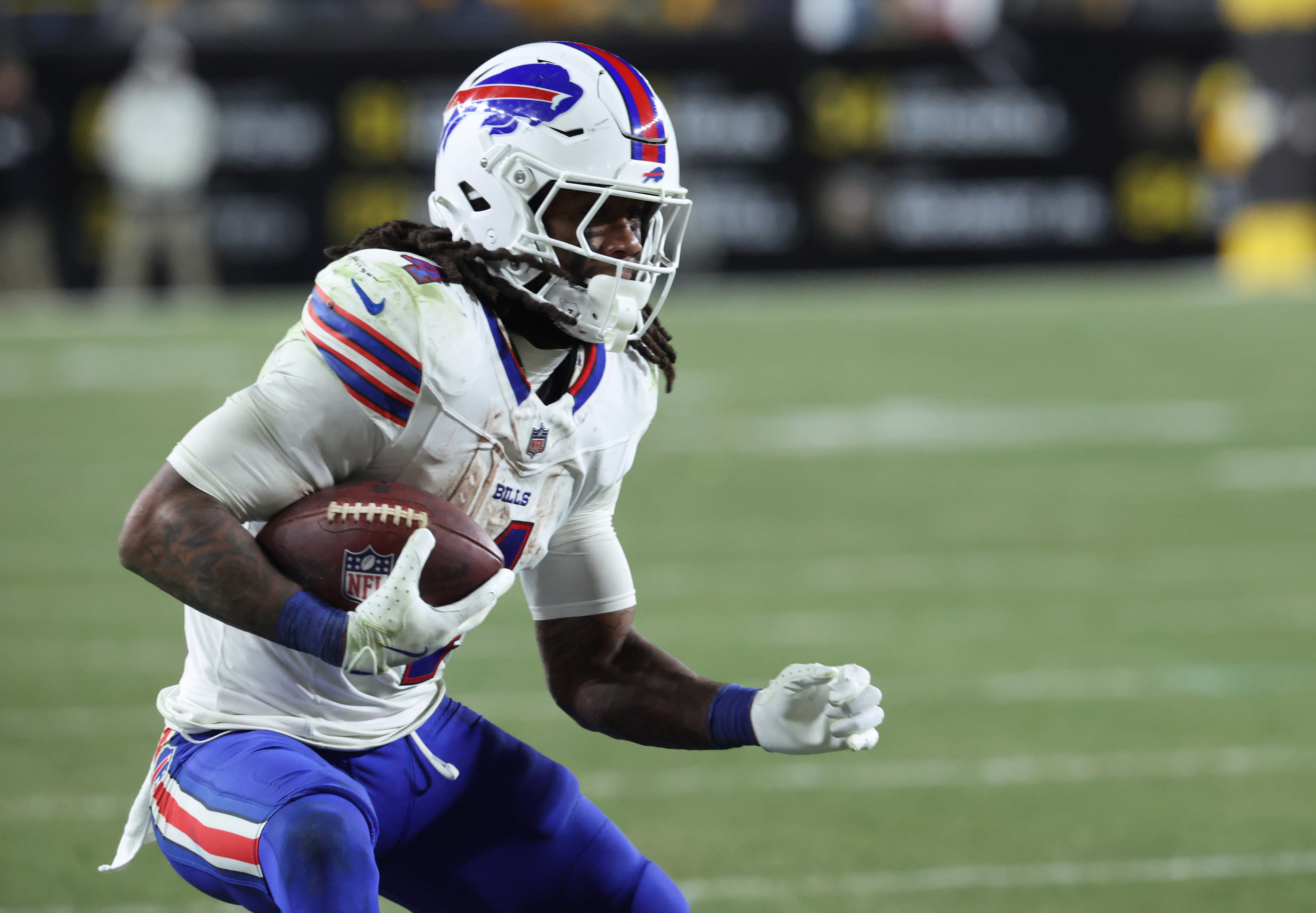Nov 30, 2025; Pittsburgh, Pennsylvania, USA; Buffalo Bills running back James Cook III (4) rushes during the fourth quarter against the Pittsburgh Steelers at Acrisure Stadium.