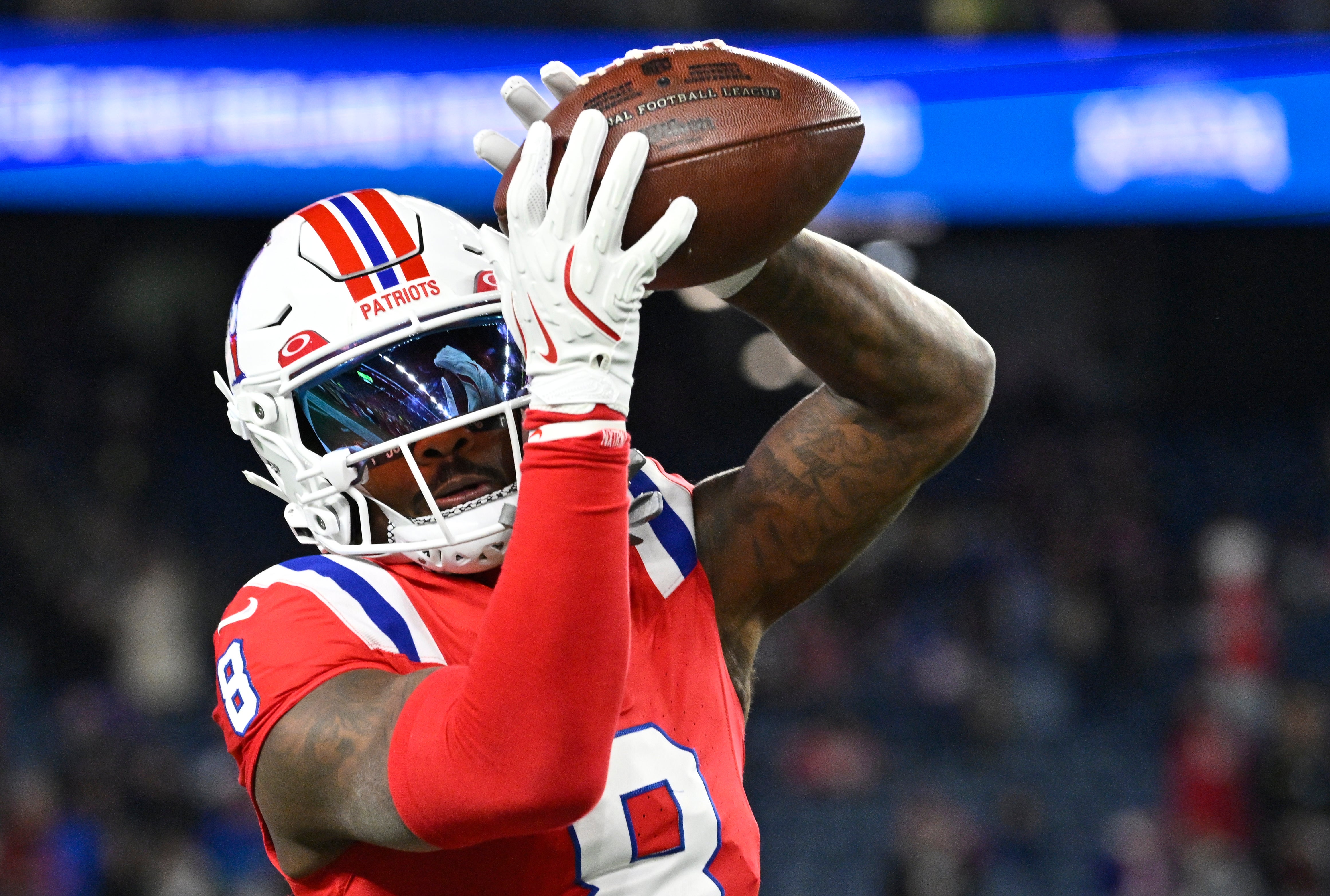 Dec 1, 2025; Foxborough, Massachusetts, USA; New England Patriots wide receiver Stefon Diggs (8) catches a pass during warmups prior to the game against the New York Giants at Gillette Stadium.