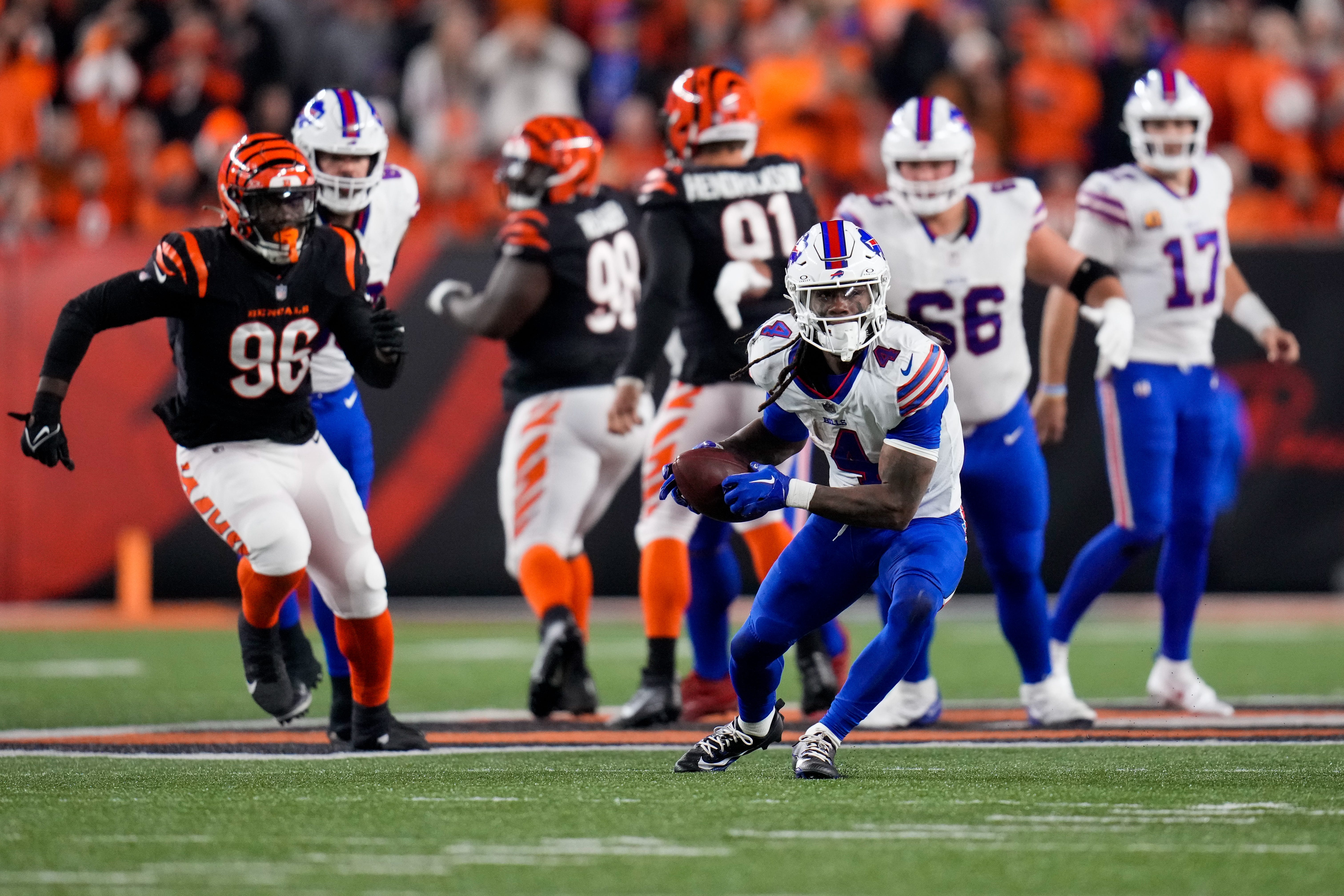 Buffalo Bills running back James Cook (4) breaks away after catching a pass in the third quarter of the NFL Week 9 game between the Cincinnati Bengals and the Buffalo Bills at Paycor Stadium in Cincinnati on Sunday, Nov. 5, 2023.
