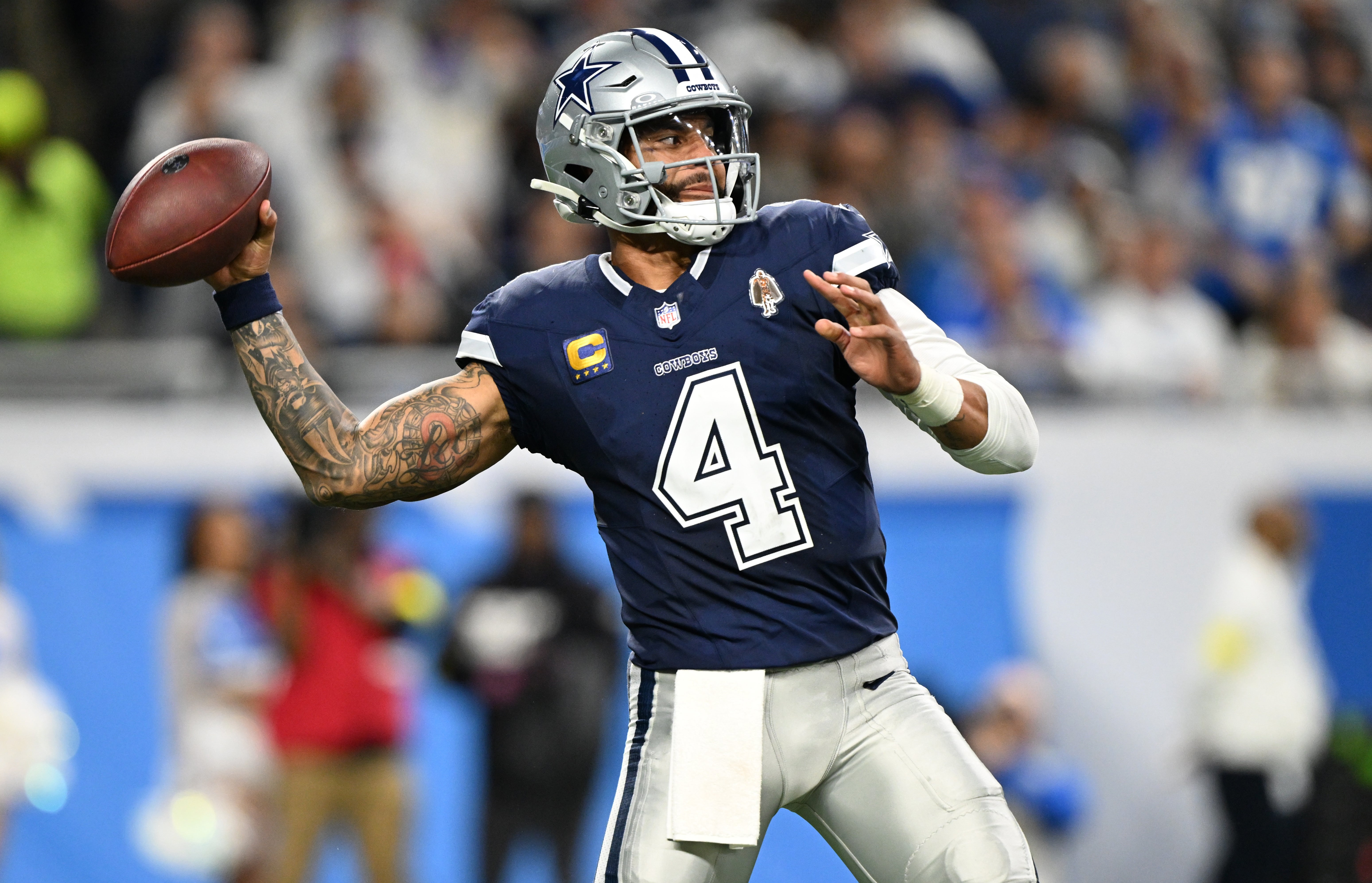 Dec 4, 2025; Detroit, Michigan, USA; Dallas Cowboys quarterback Dak Prescott (4) throws during the first half against the Detroit Lions at Ford Field.