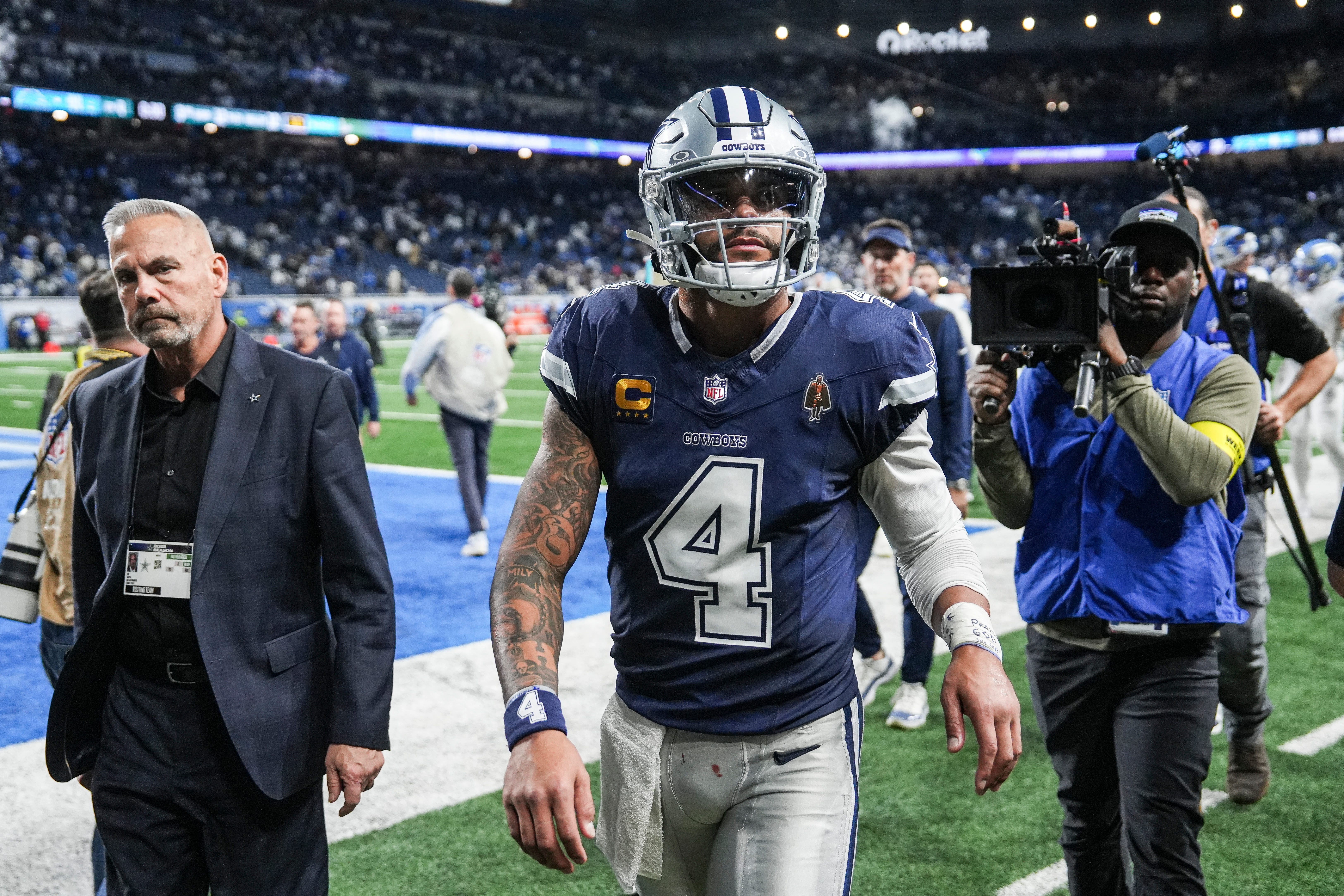 Dallas Cowboys quarterback Dak Prescott (4) walks off the field after 44-30 loss at Ford Field in Detroit on Thursday, Dec. 4, 2025.
