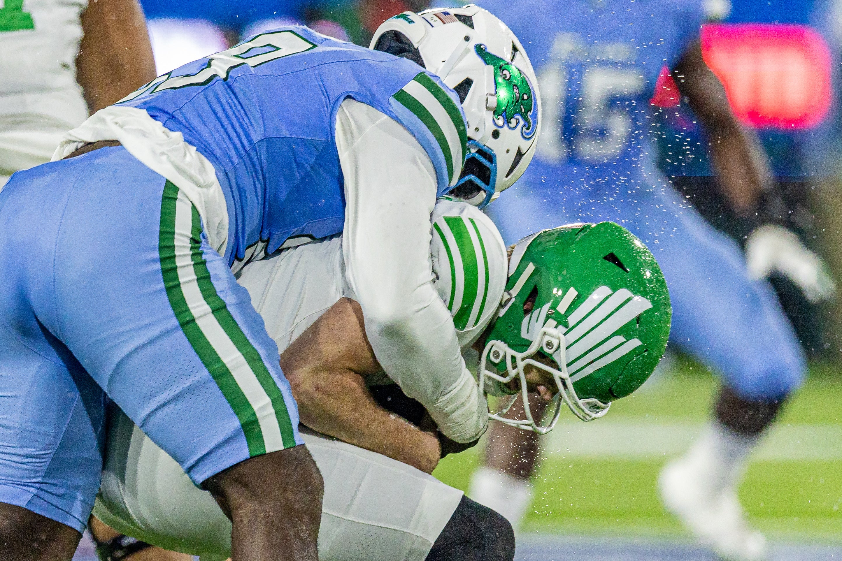 Dec 5, 2025; New Orleans, LA, USA; Tulane Green Wave defensive lineman Santana Hopper (29) sacks North Texas Mean Green quarterback Drew Mestemaker (17) during the first half in the 2025 American Championship at Yulman Stadium.